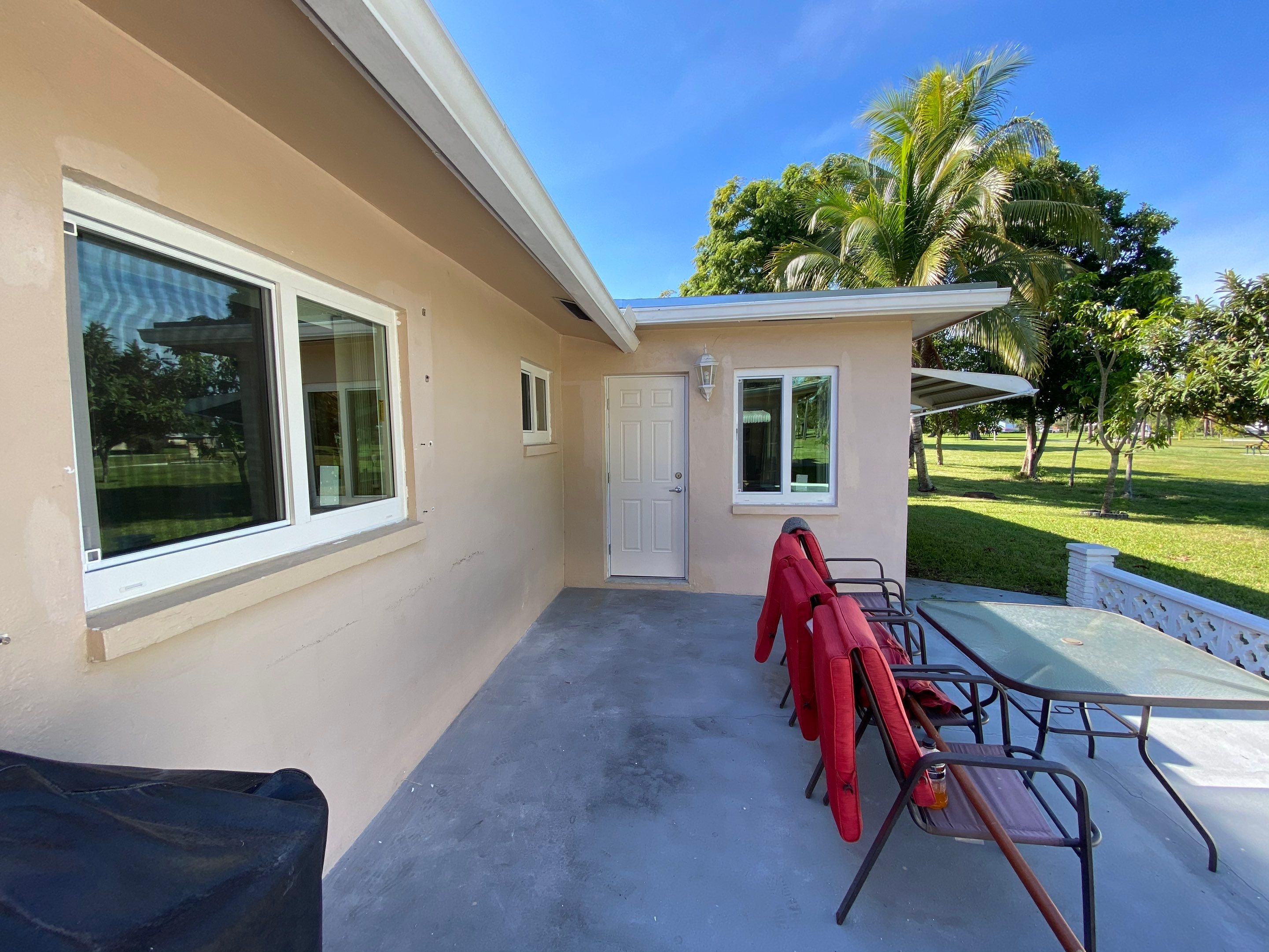 Tamarac Residential Entry Door and Aluminum Window Installation Project by The Door Doctor of South Florida, Inc.