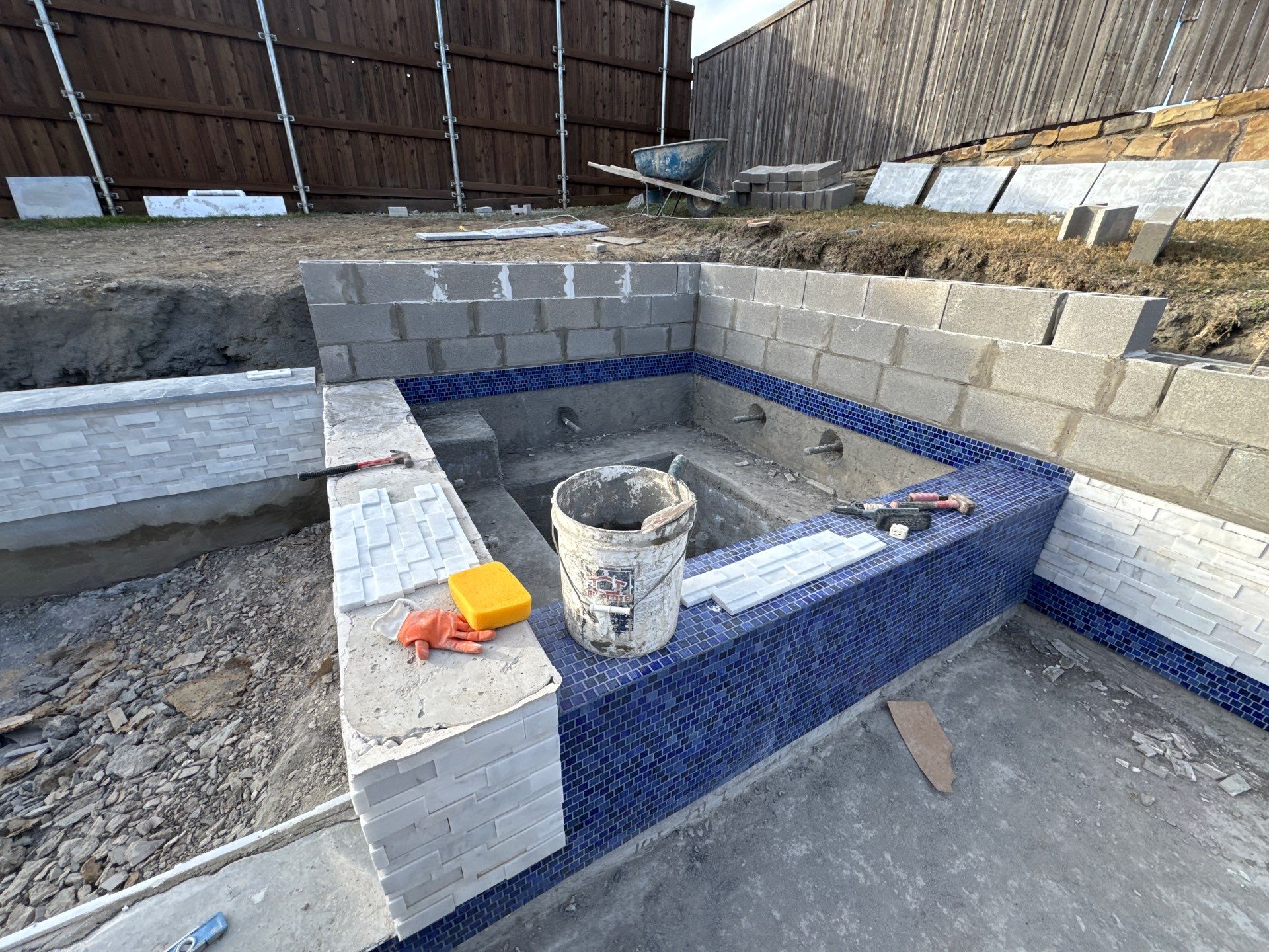 Geometric Pool with Raised Spa and Tile Spillway by Pinnacle Pools and Spas - DFW