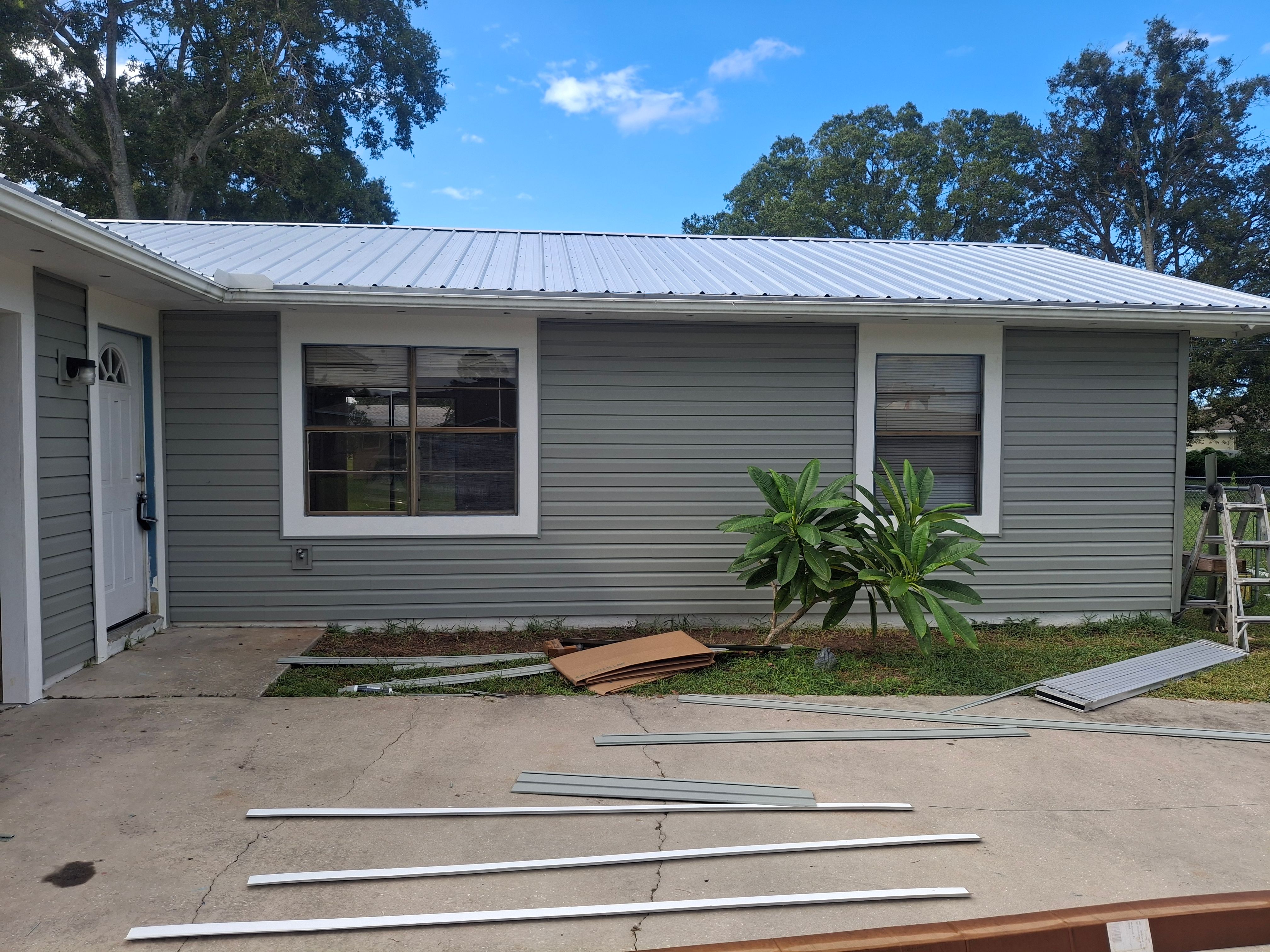 Vinyl Siding Installation and Structural Wood Rot Repair in Palm Bay by Florida Roofing and Renovations Inc.