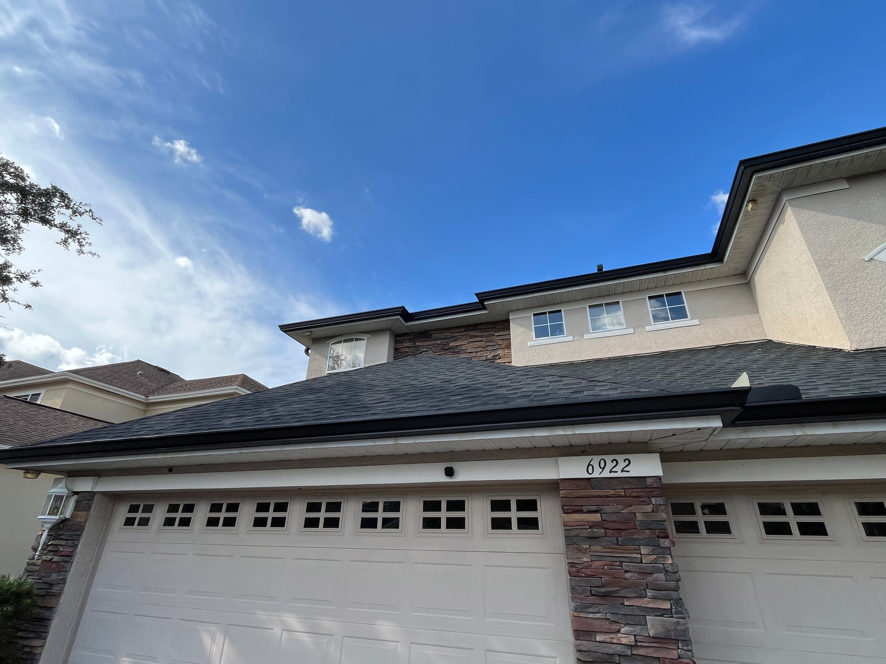 Black 6-inch Seamless Gutters for Modern Ellenton Homes FL by Gutter Professors