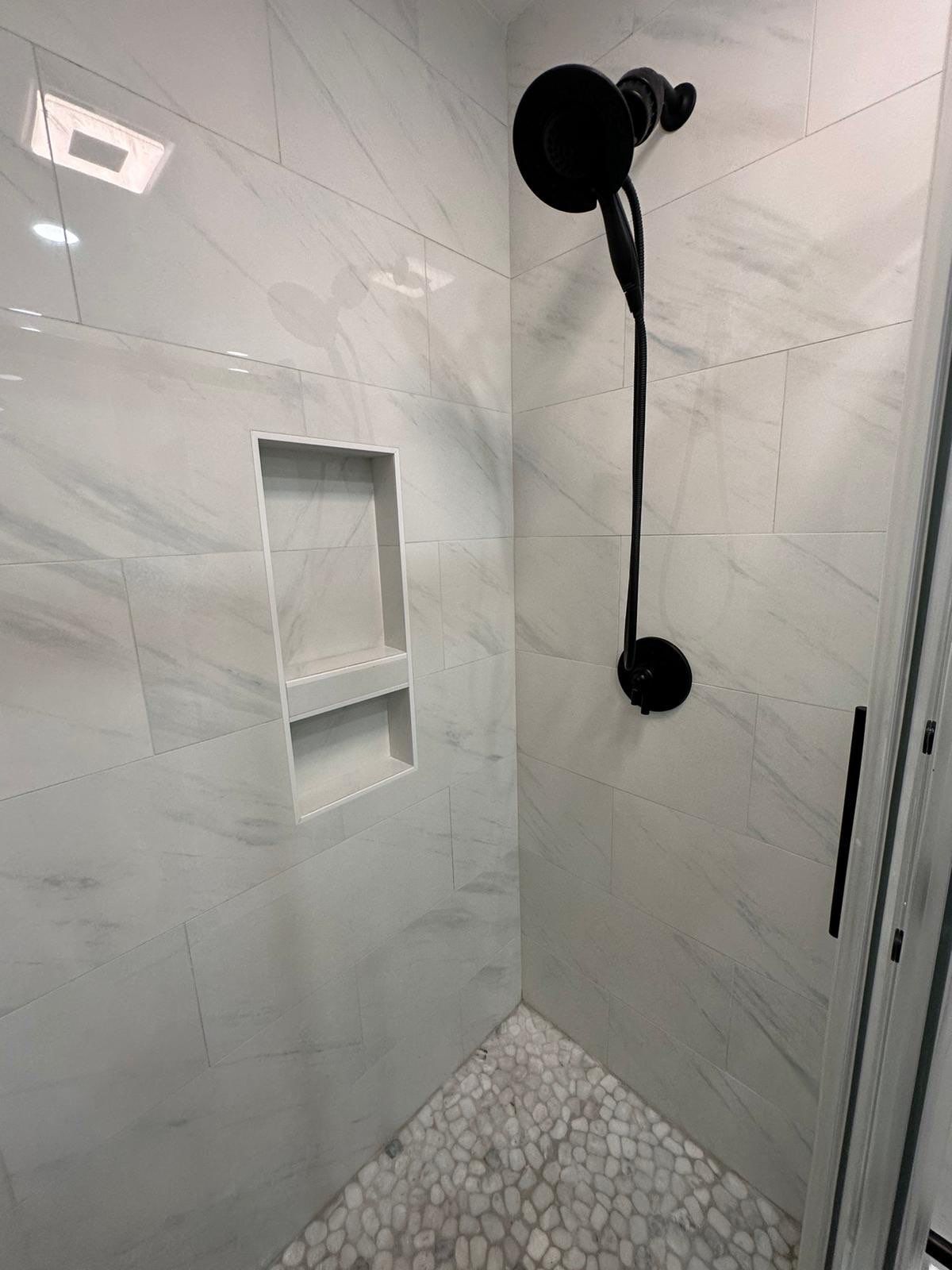 Bathroom Remodel using Tile by Home Concepts Construction