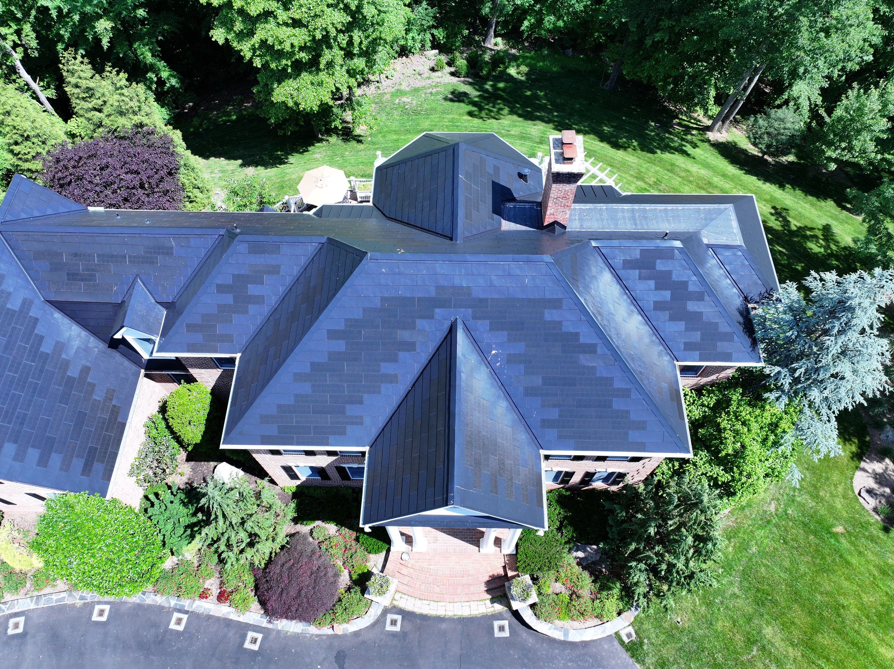 Tesla Solar Roof Replacement by American Home Contractors