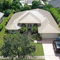 24ga 1.5" Mechanical Seam Sierra Tan by Total Roofing System The Metal Roof Experts