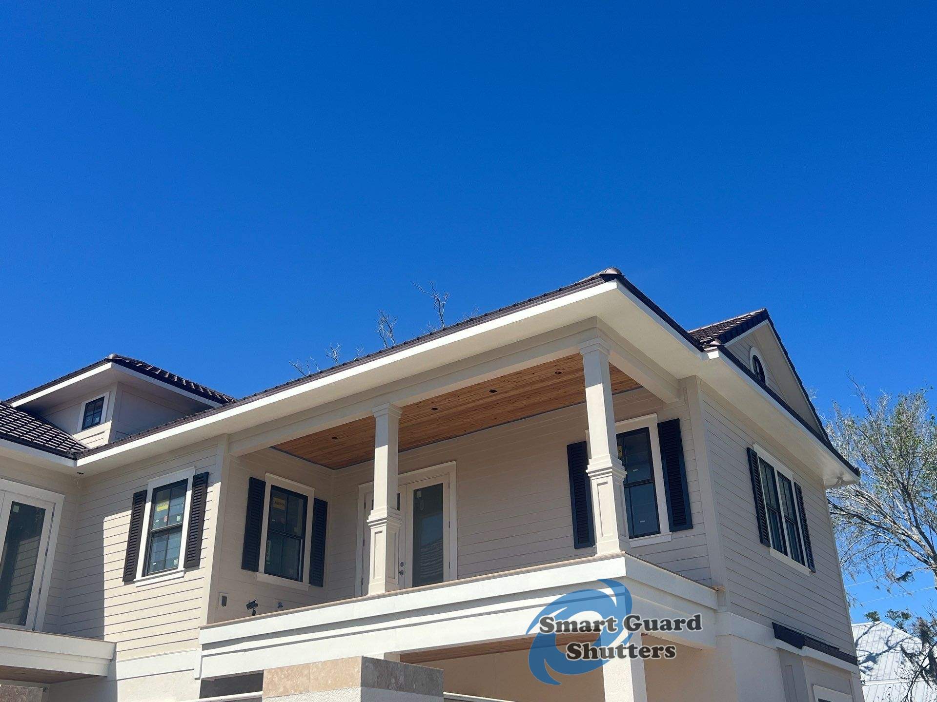 Decorative Colonial Shutters in Grey Brown by Smart Guard Shutters