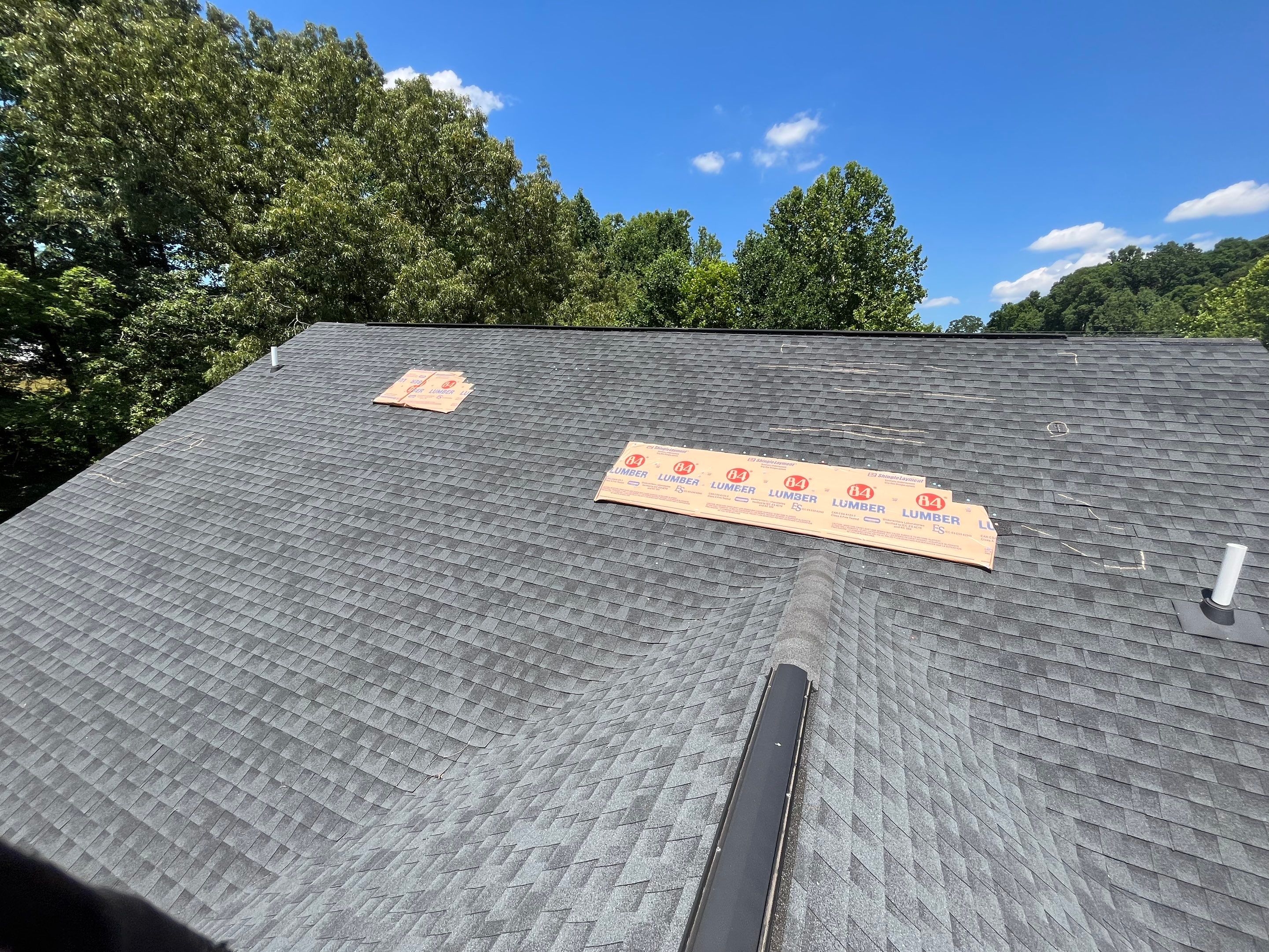 Residential Roof Installation by KISH RESTORATION 
