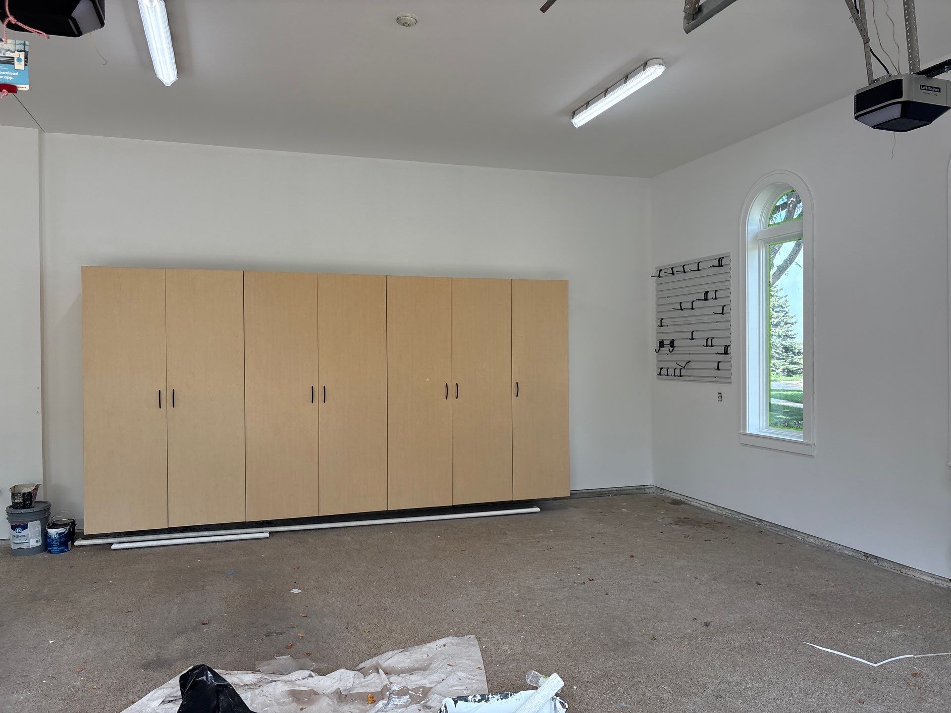 Garage Interior Painting and Cabinet Installation in Sioux Falls by Select Painting, Coatings & Garage Cabinets