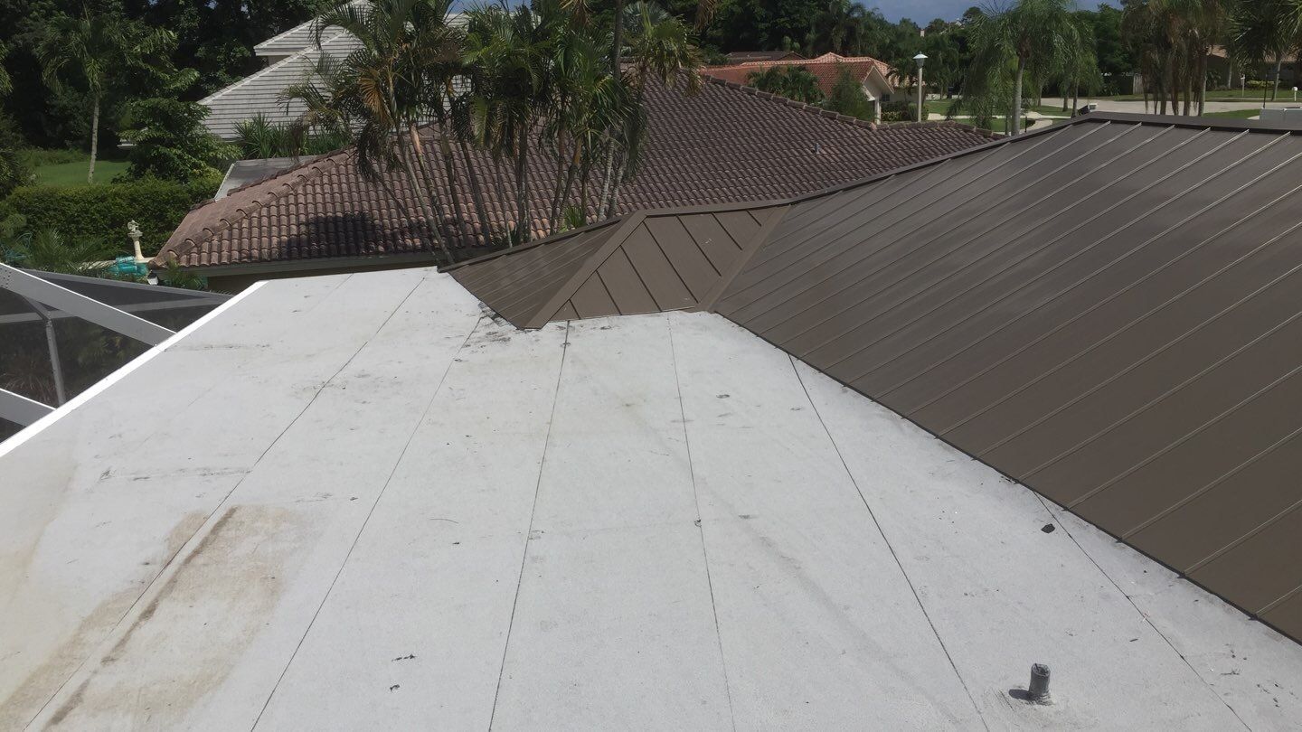 Residential Roofing Installation using 1" Nail strip metal roof by BLUES BROTHERS ROOFING