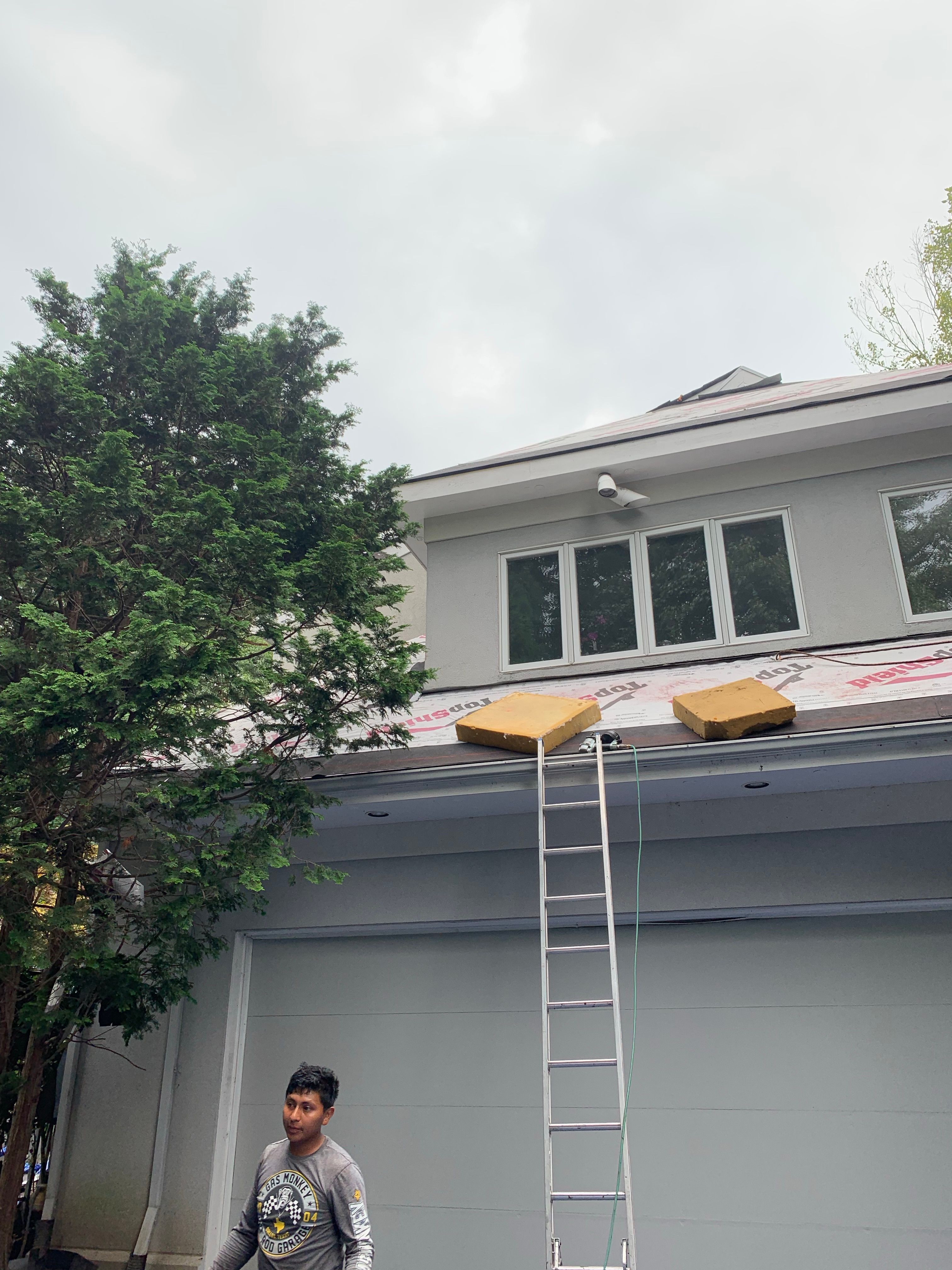 Skylight, Roof, and Gutter Replacement by American Home Contractors