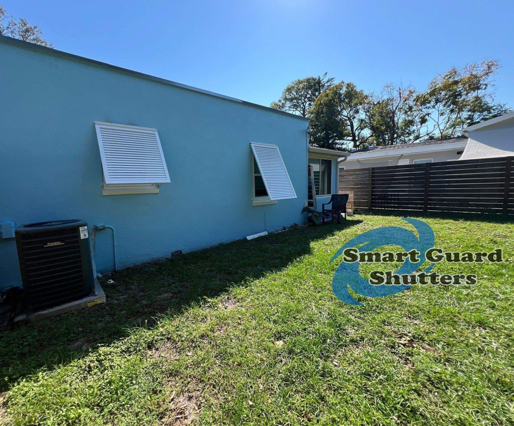 Decorative Bahama Shutters in Signal White  by Smart Guard Shutters