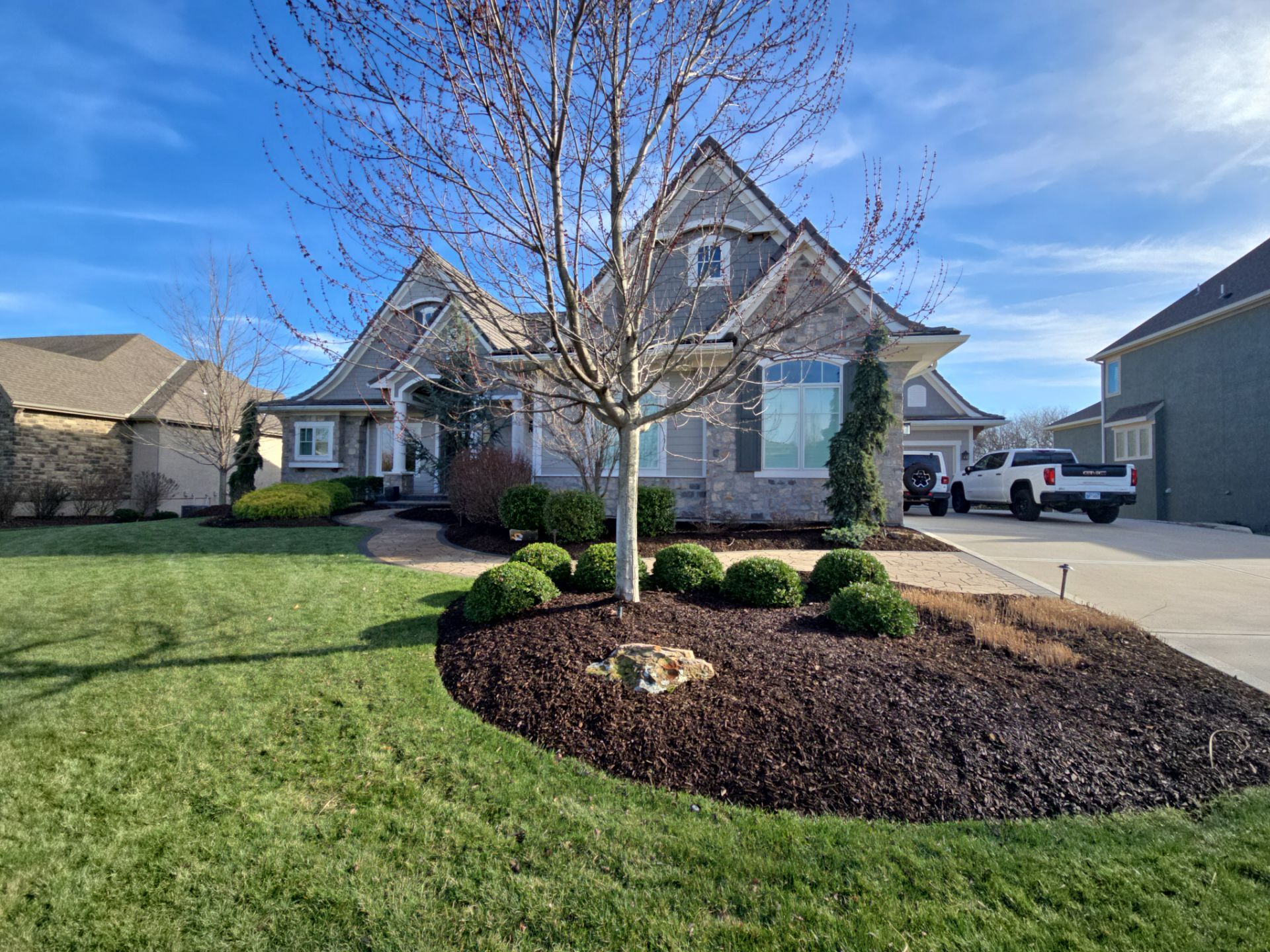 Front Yard Landscape and Walkway Renovation in Overland Park by LAND ESCAPES LLC