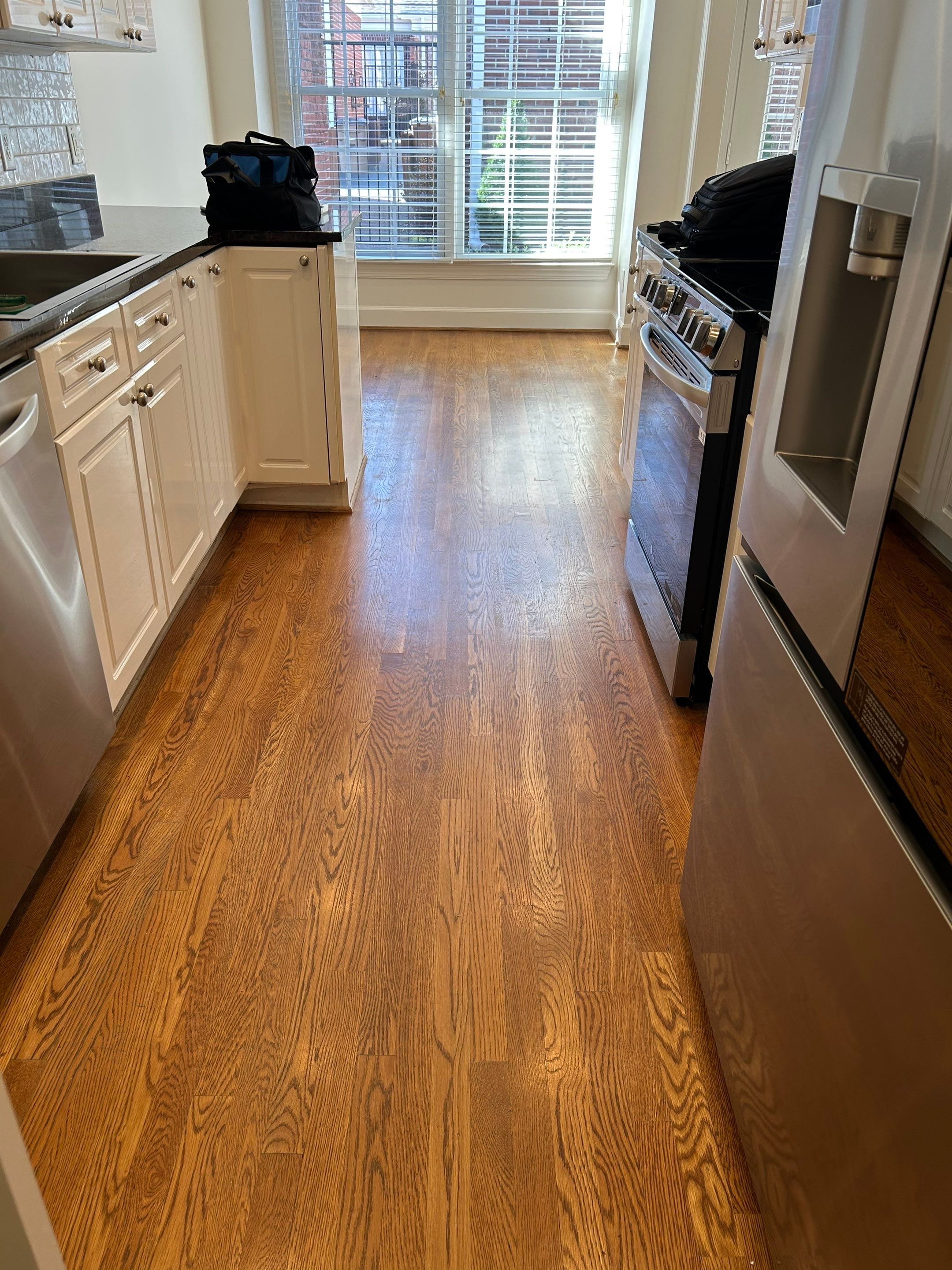 Harwood installation and refinish throughout by Footprints Floors of Nashville