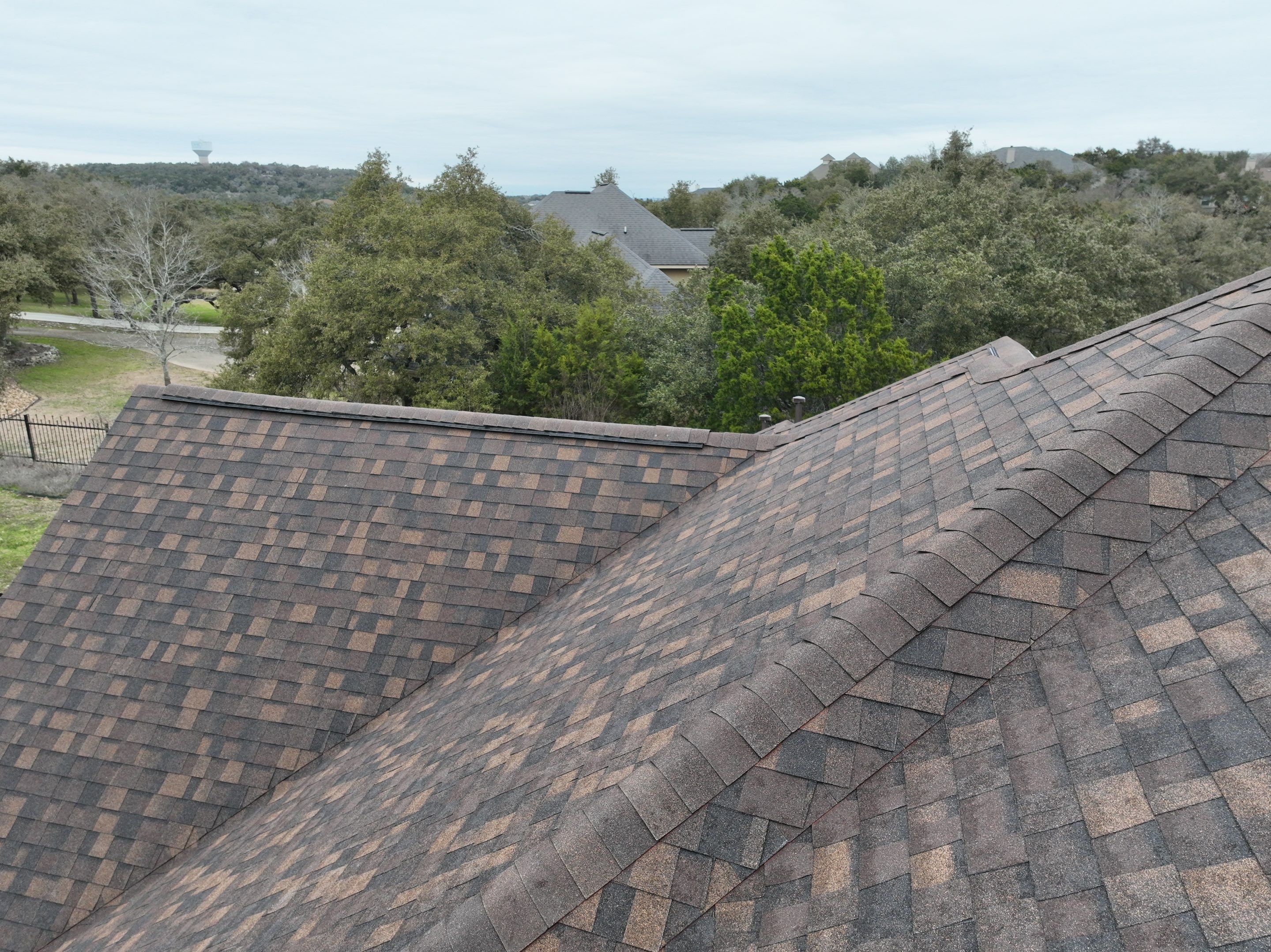Residential Roof Replacement using 30 Year Laminate Shingles with High Profile Ridge by Premier Roofing and Contracting