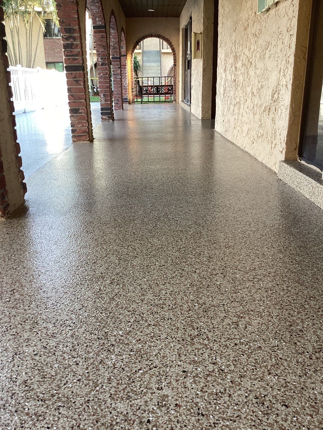 Pool Deck using Orbit and Tidal Wave by Amvet concrete coatings llc