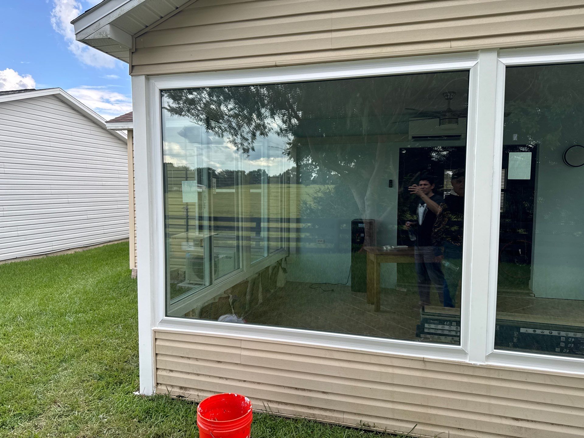 Sunroom Conversion with Alside Windows and Provia Door in The Villages by Windows & Doors Store