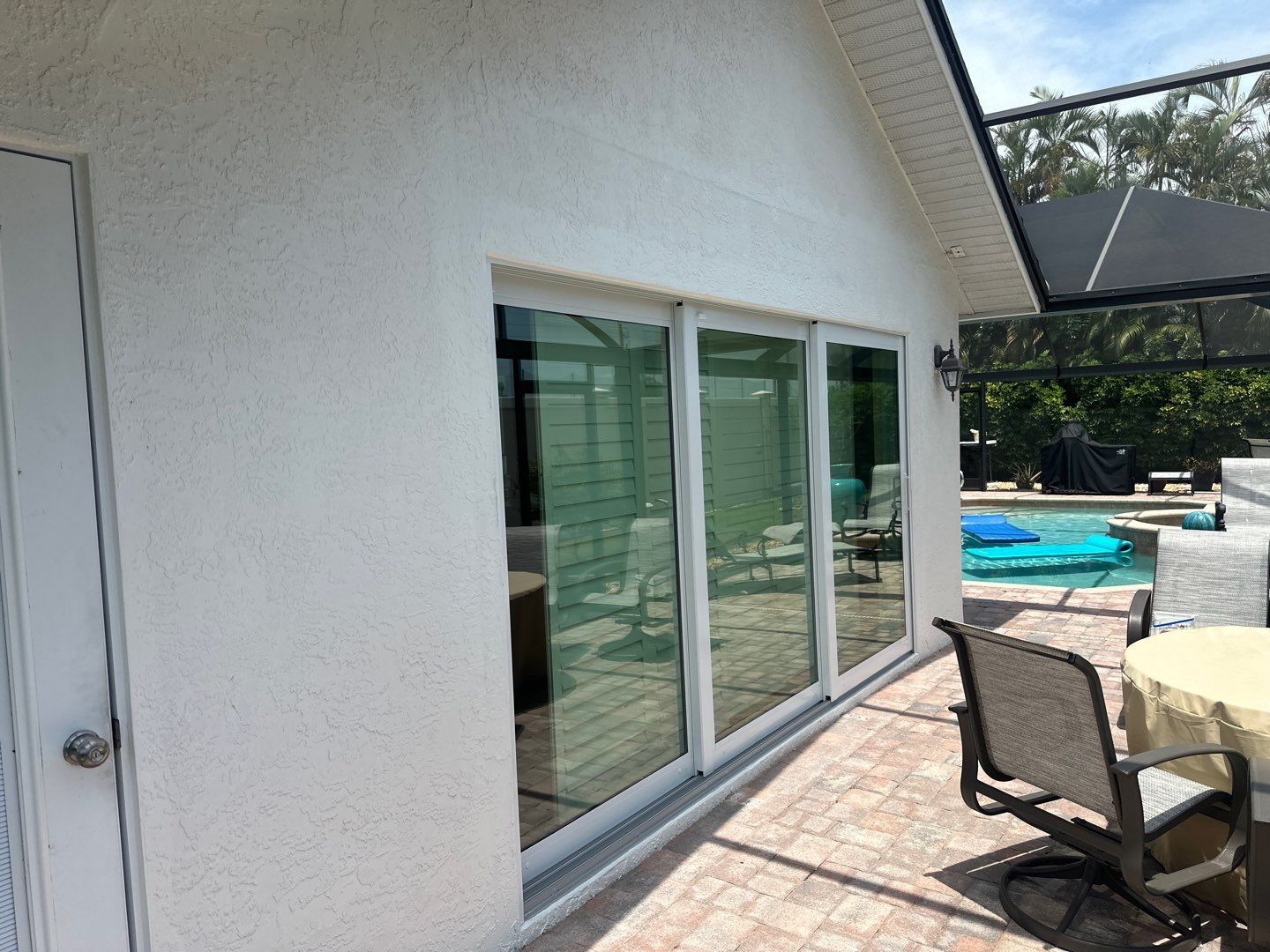 Window Installation using PGT Aluminum for the doors and PGT Vinyl for the Windows  by Windows For Life 
