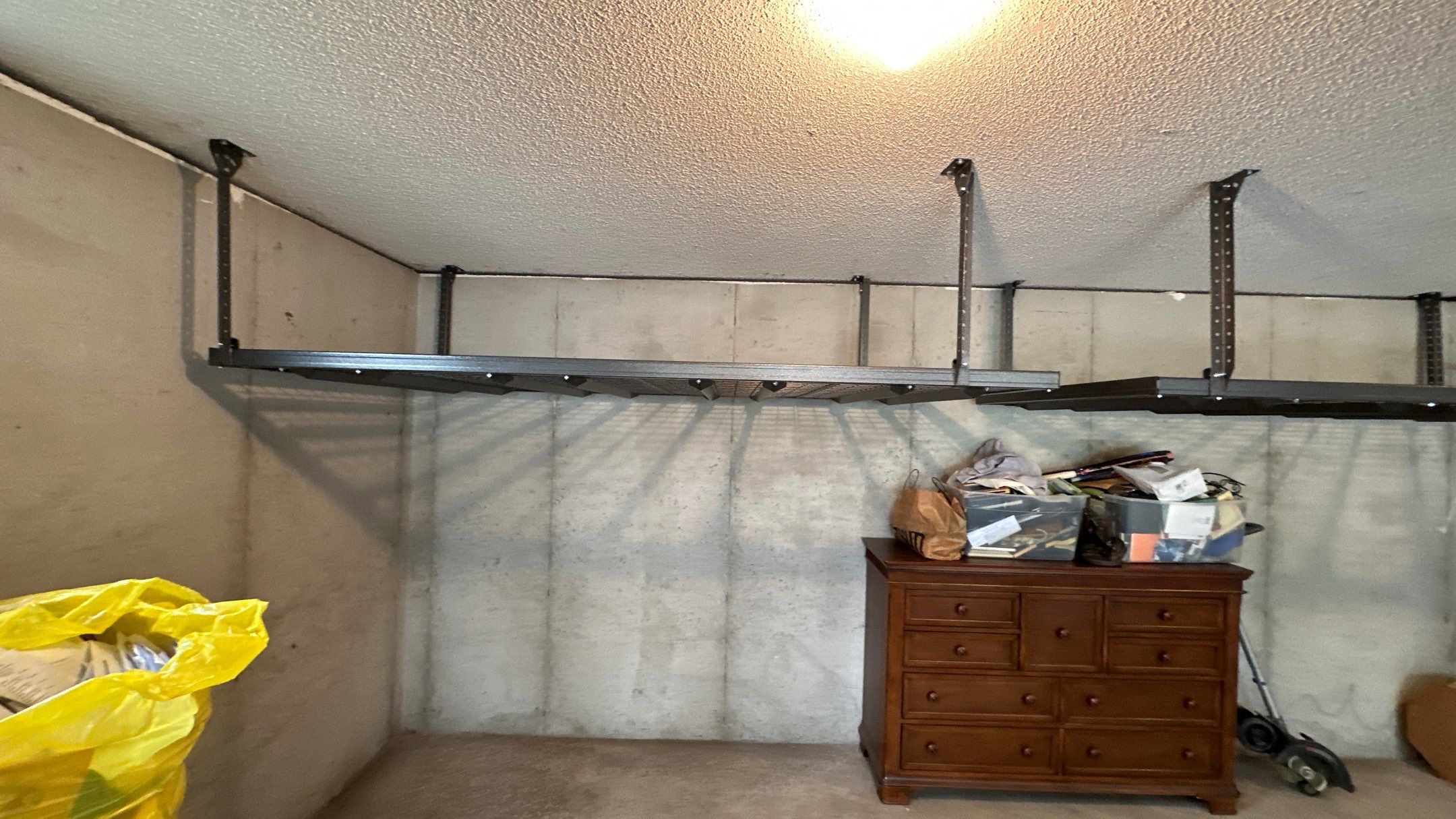Mike F. added overhead racks to his garage  by Banner Garage