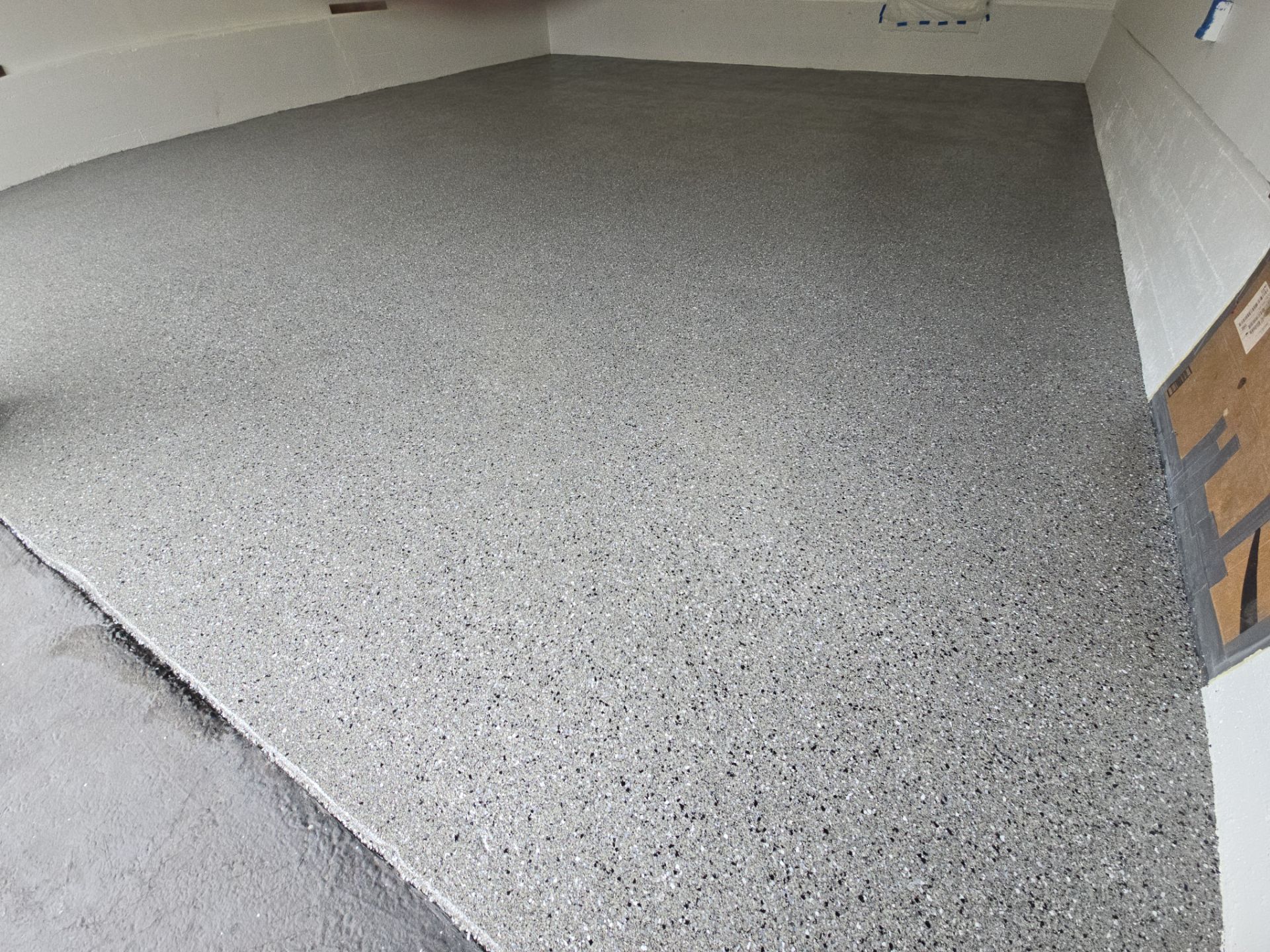 Garage Transformation using Slate Hybrid by Croc Coatings, LLC
