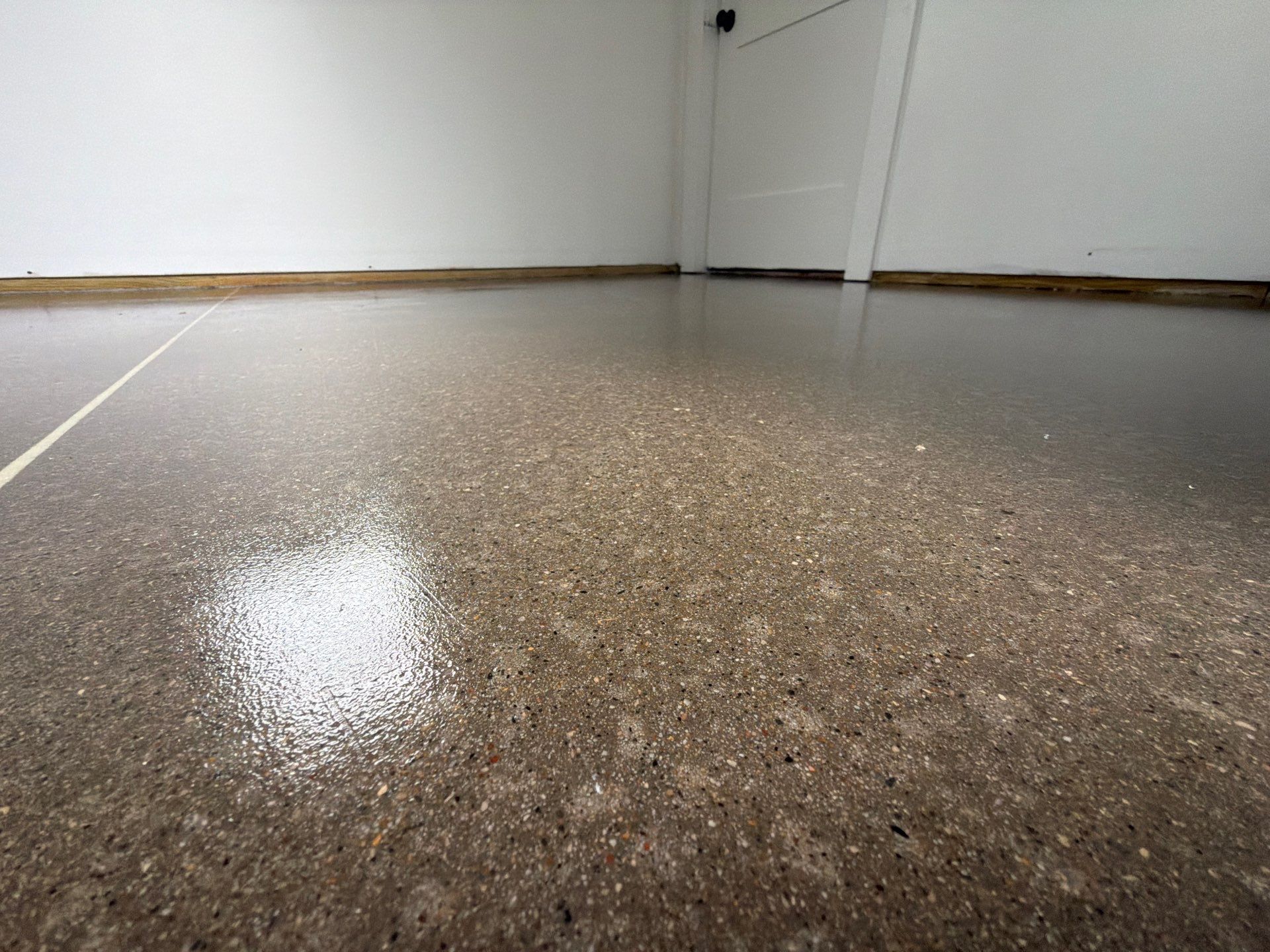 Speckled Epoxy Floor Installation and Concrete Refinishing in Nunica by Gordon Painting
