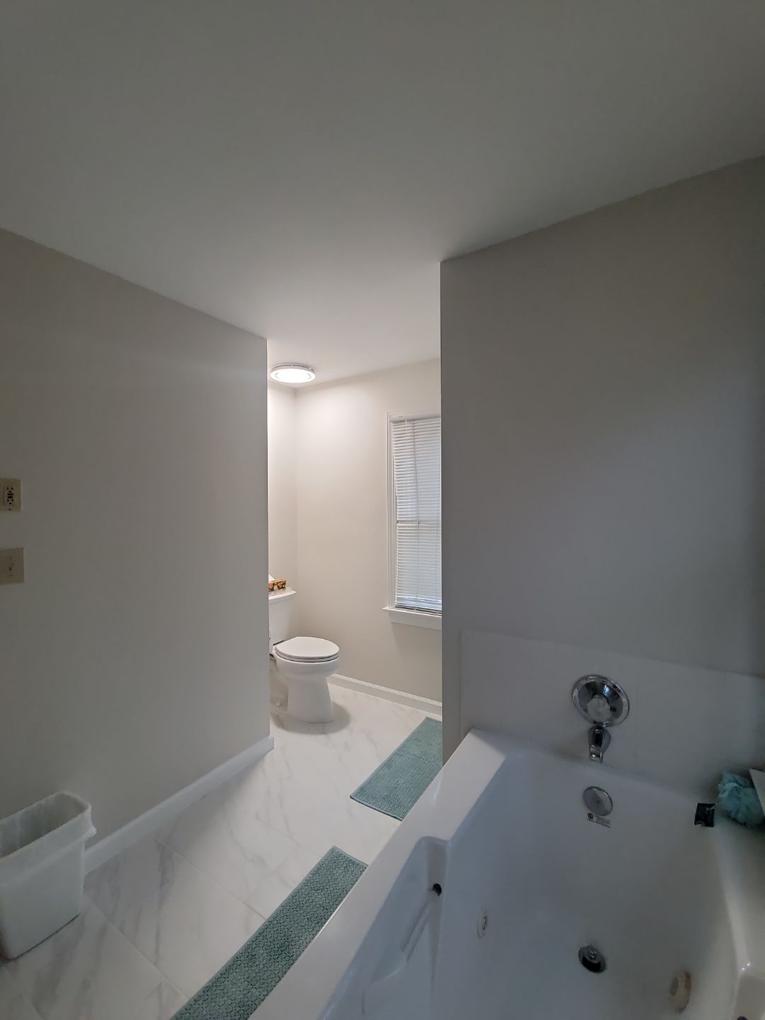 From Cramped & Carpeted to Bright & Modern: A Cary Bathroom Transformation by Elite Remodeling and Design LLC