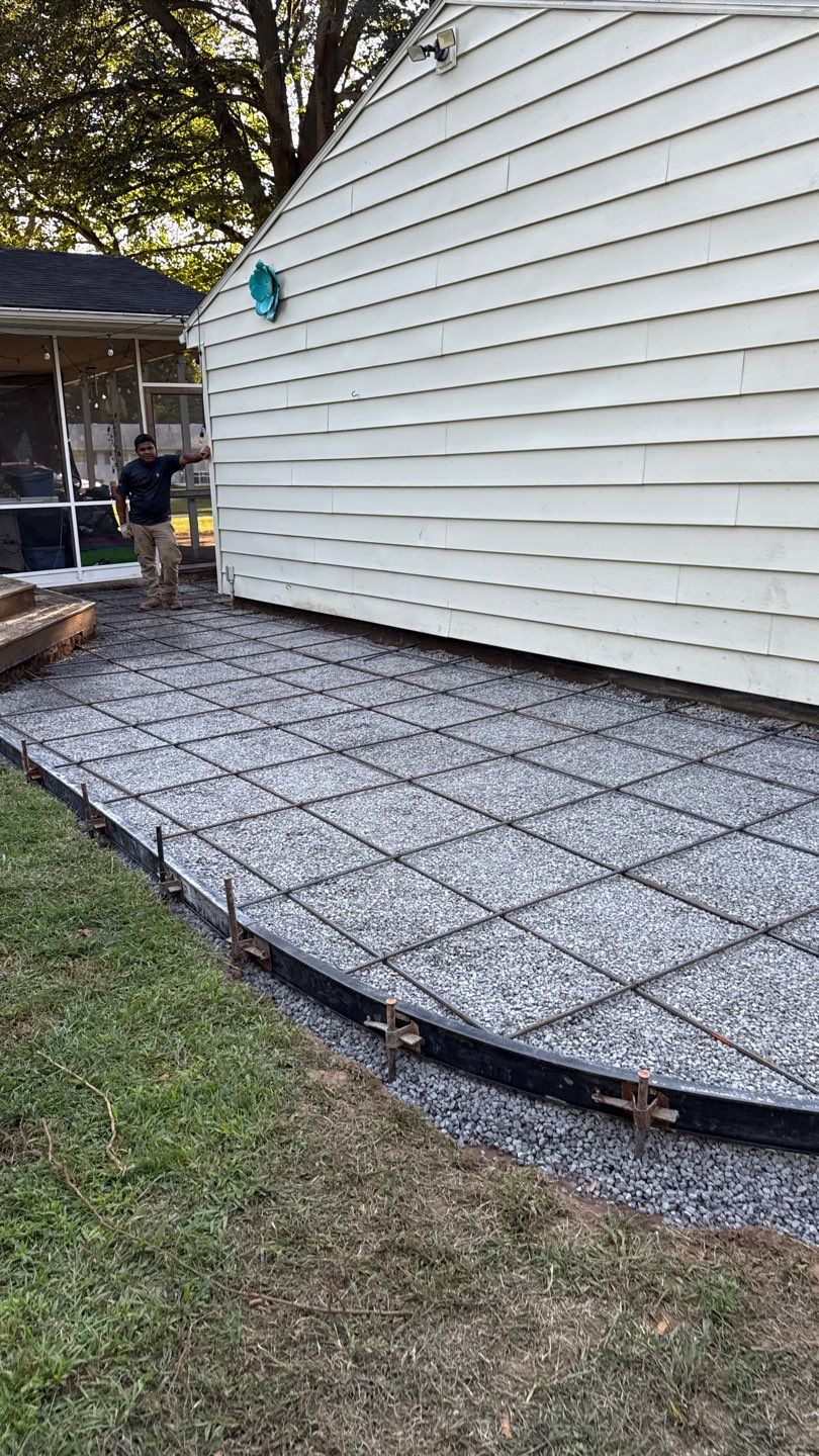 Oxford slate stamped patio  by NG Masonry & Construction LLC