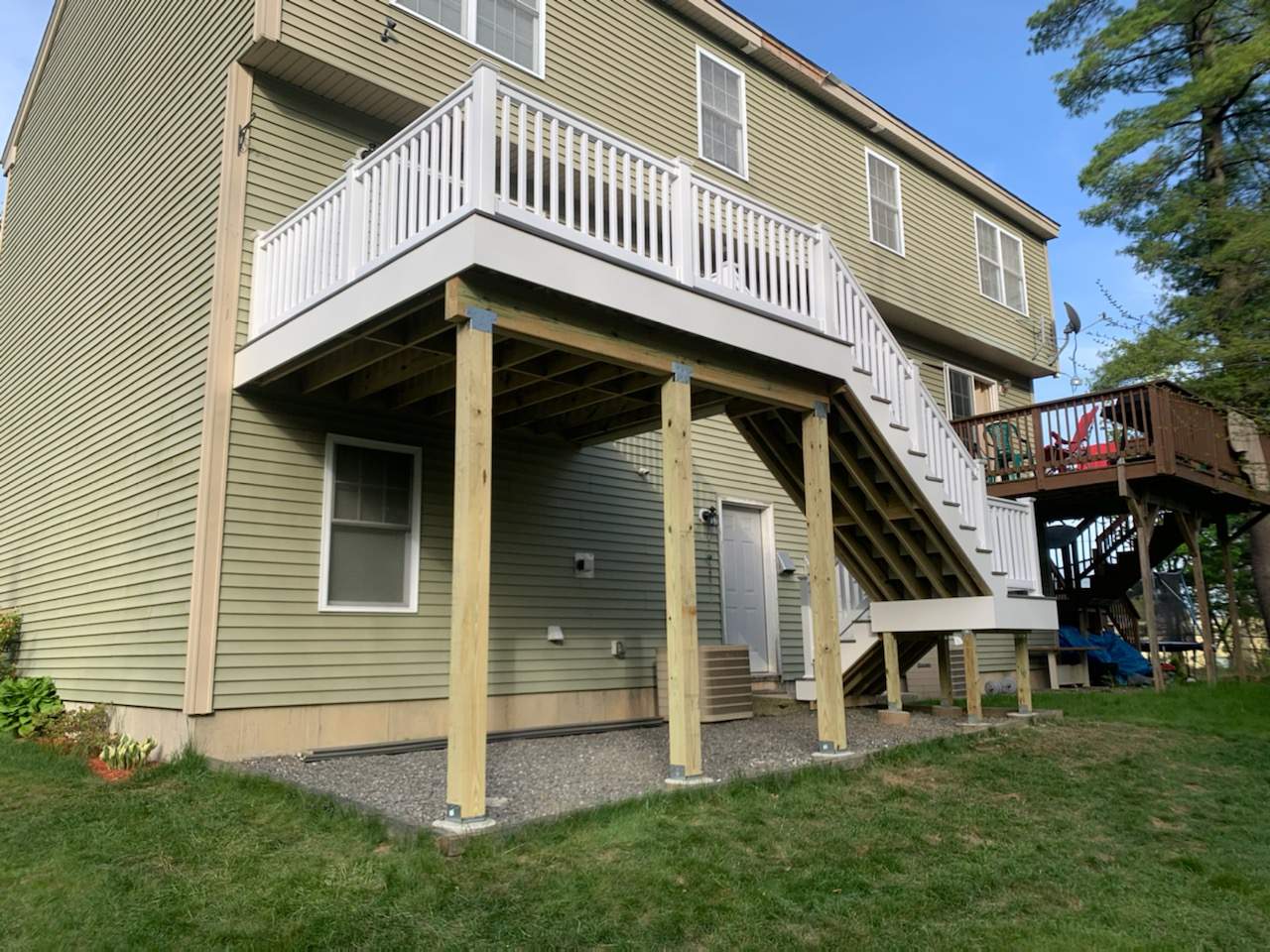 Porch/Deck Construction using Trex Decking by UBrothers Construction