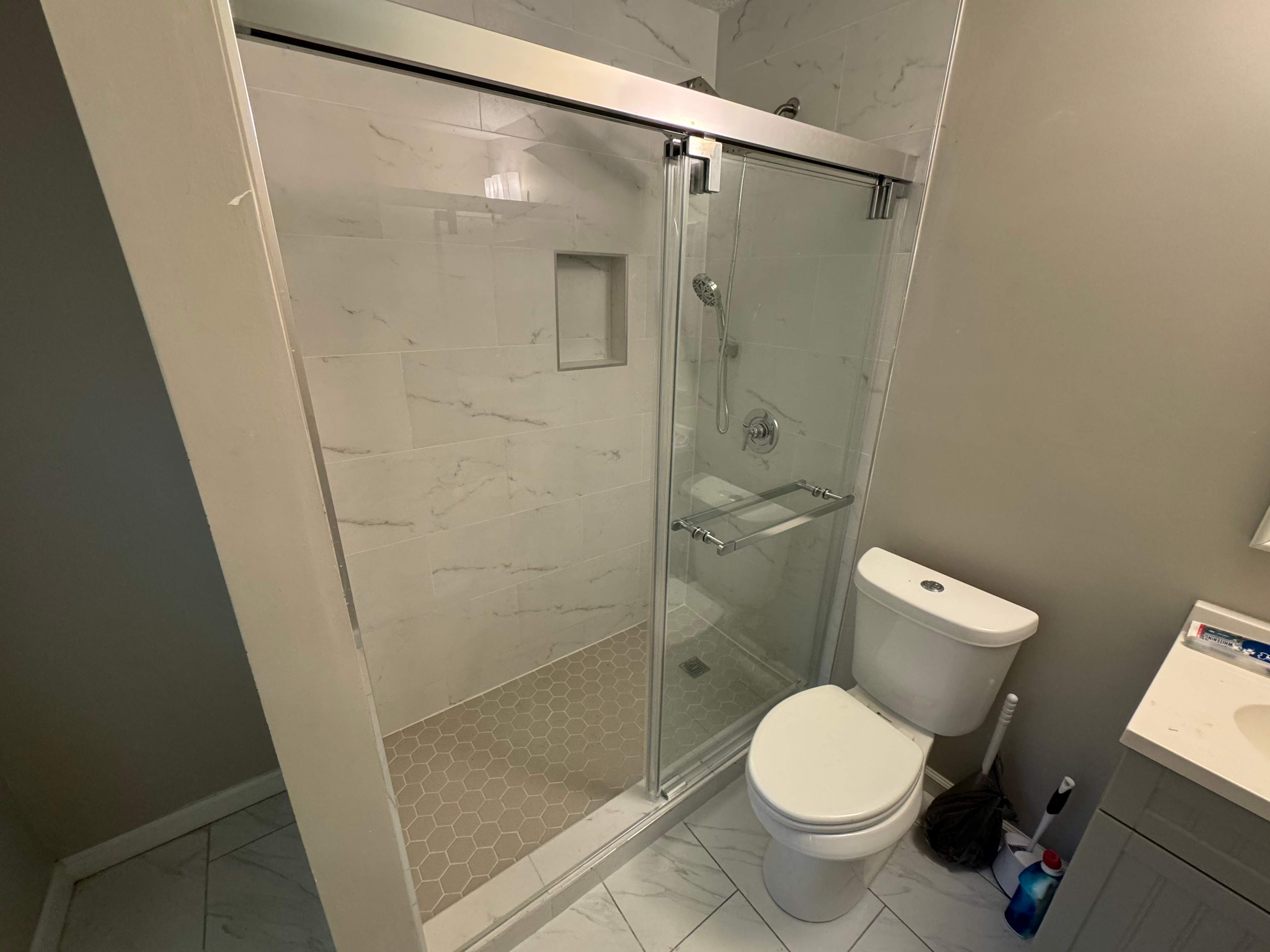 Tub to walk-in shower conversion by Prudencio