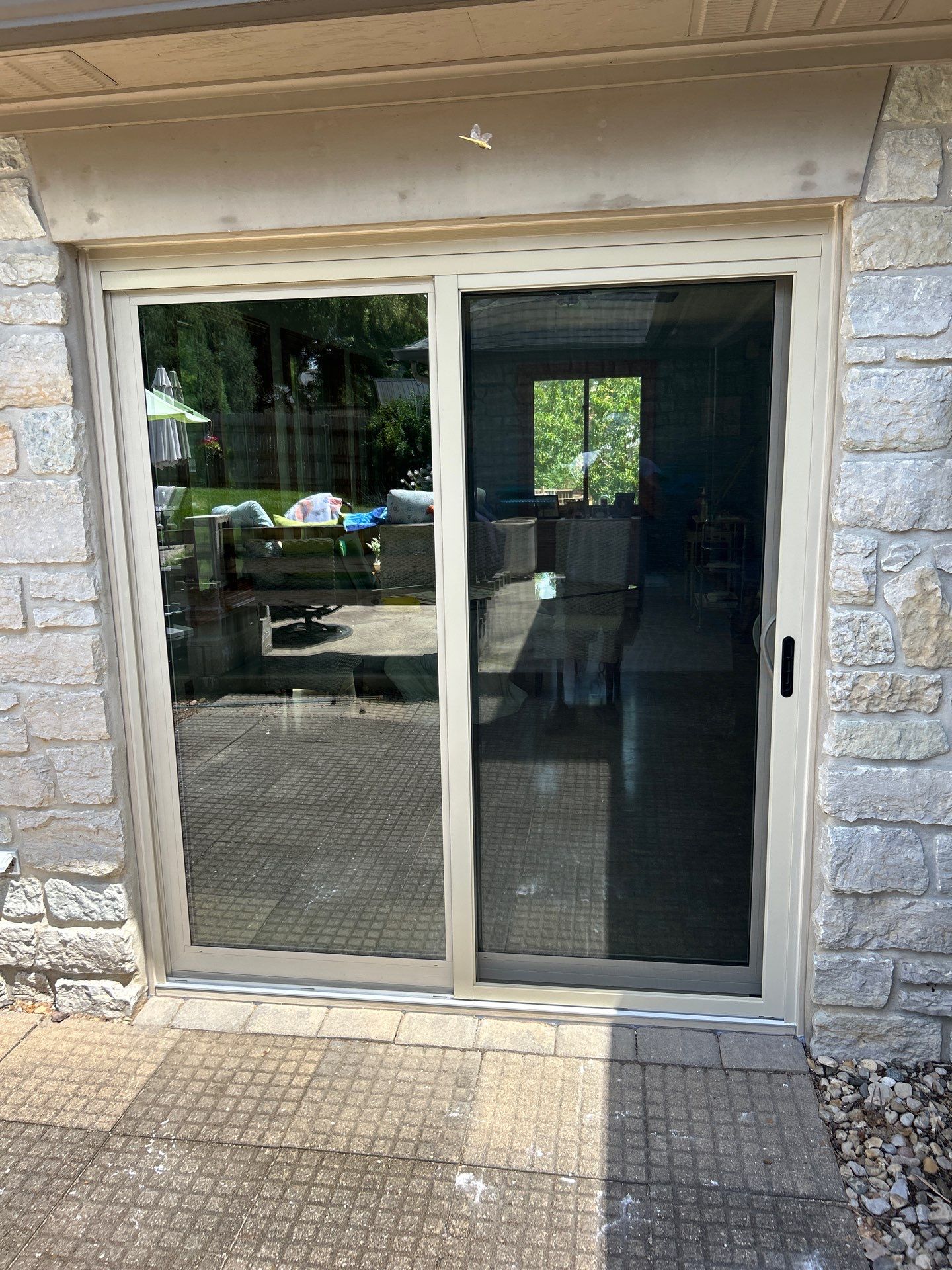 Custom Front Entry and Sliding Patio Door Replacement in Greenwood by Merrifield Exteriors, LLC
