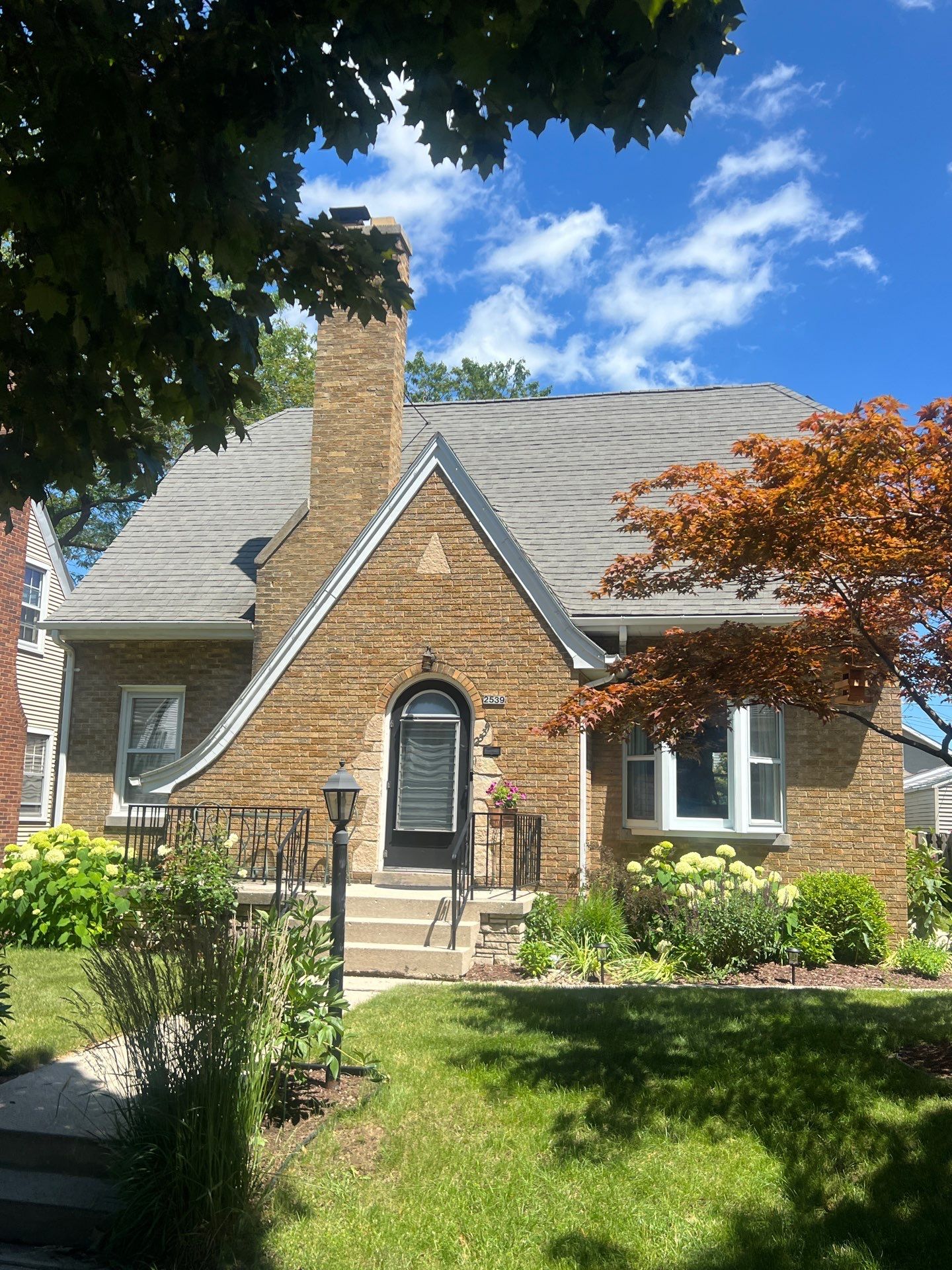 House, Garage, and Skylight Roof Replacement with GAF HDZ Charcoal Shingles and Gutter Protection by Gellings Roofing & Siding
