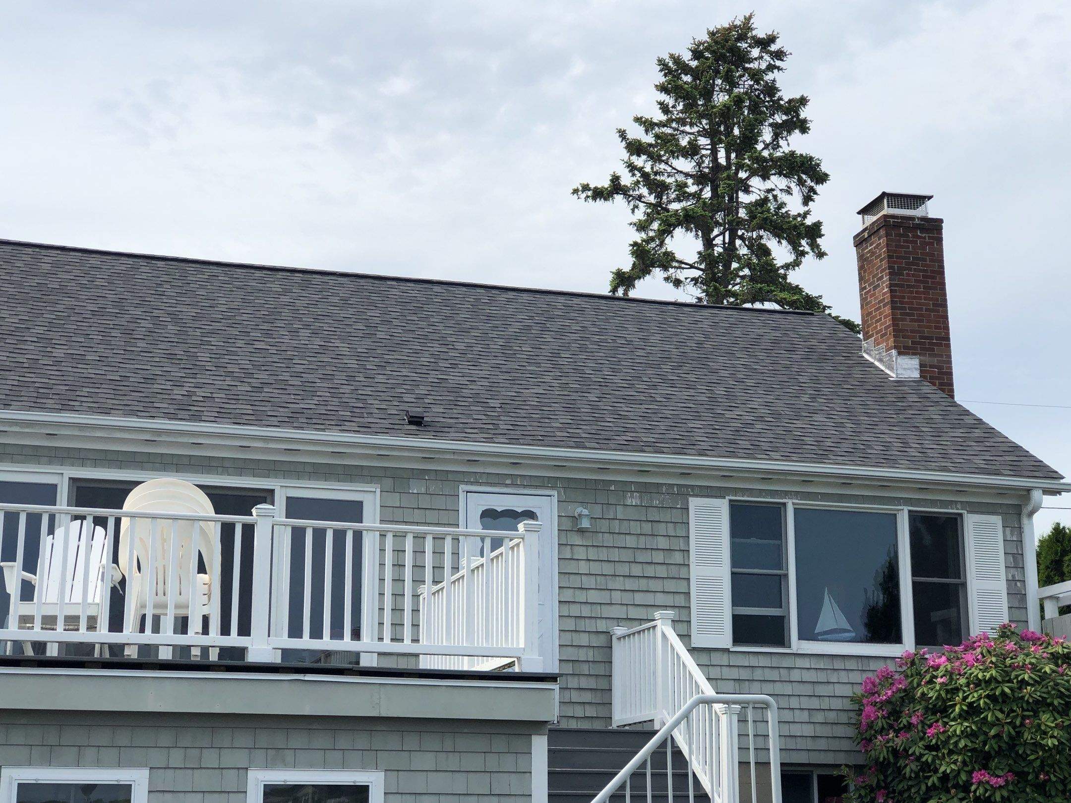 Pewterwood Roofs by Pinnacle Roofing & Skylights