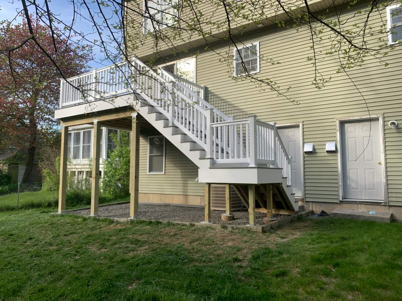 Porch/Deck Construction using Trex Decking by UBrothers Construction