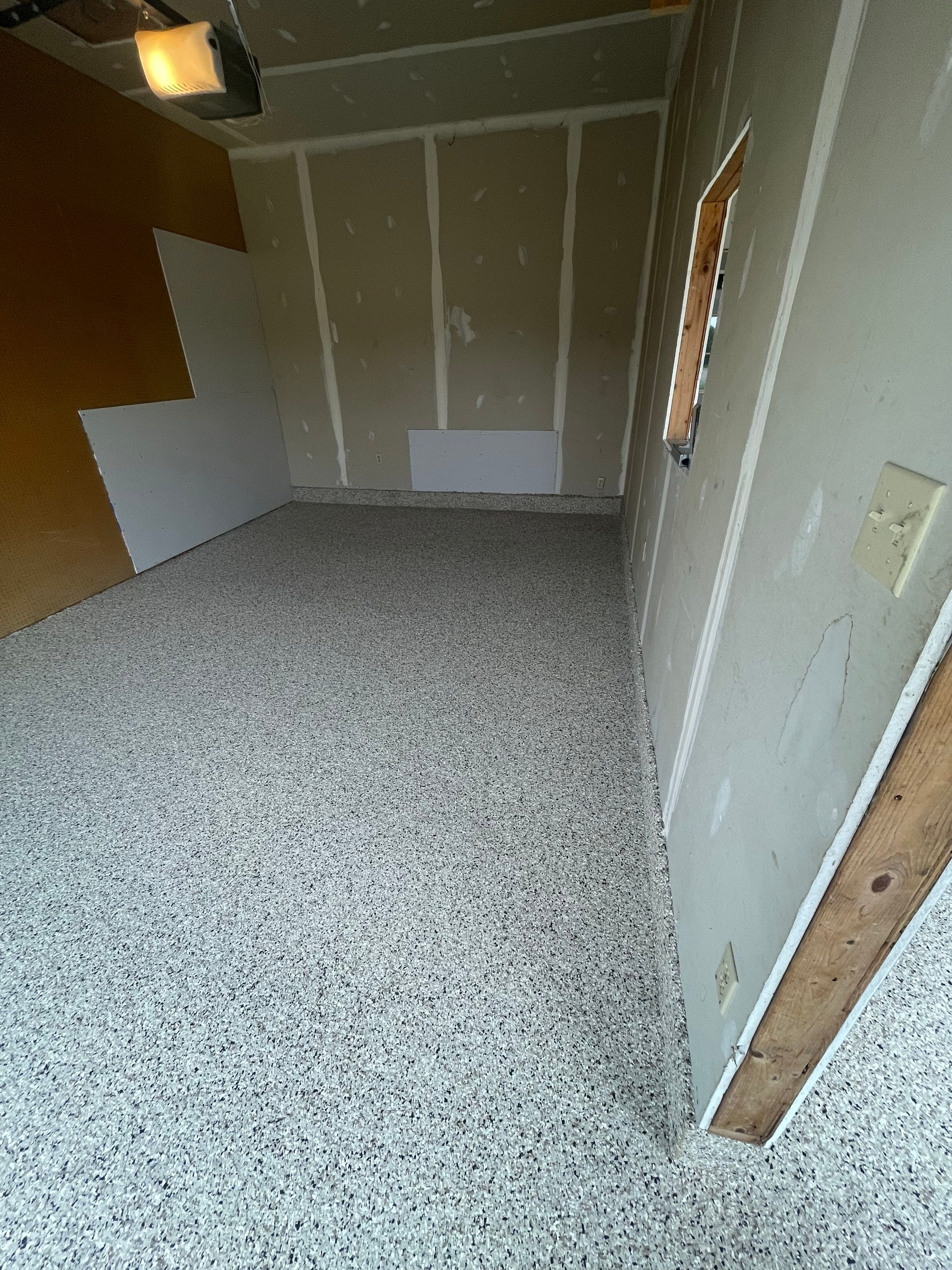 Speckled Epoxy Floor Coating Installation for Centerville Residential Garage by Select Painting, Coatings & Garage Cabinets