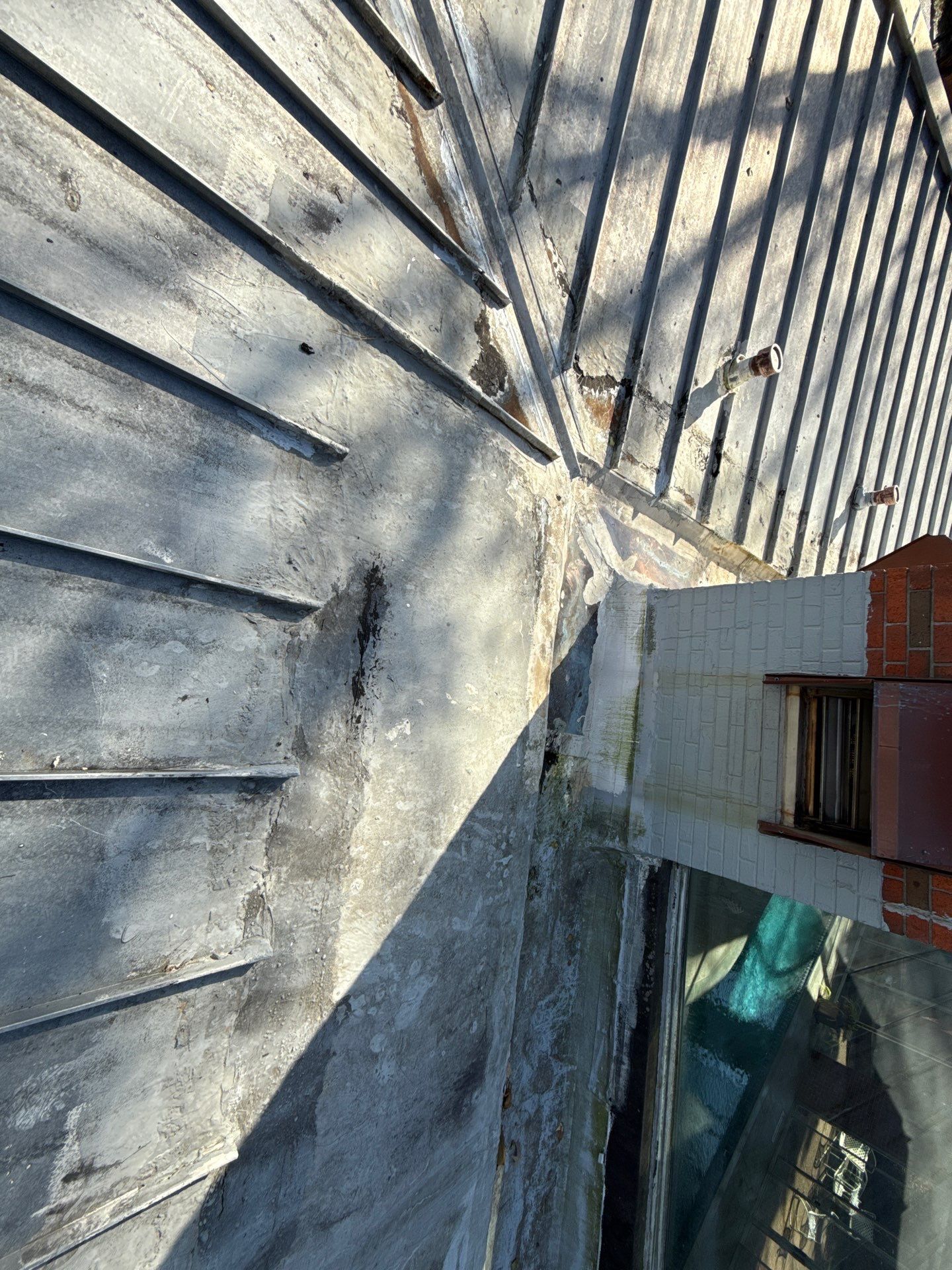 Residential Standing Seam Metal Roof and Membrane Replacement in Memphis by Revival Roofing Services