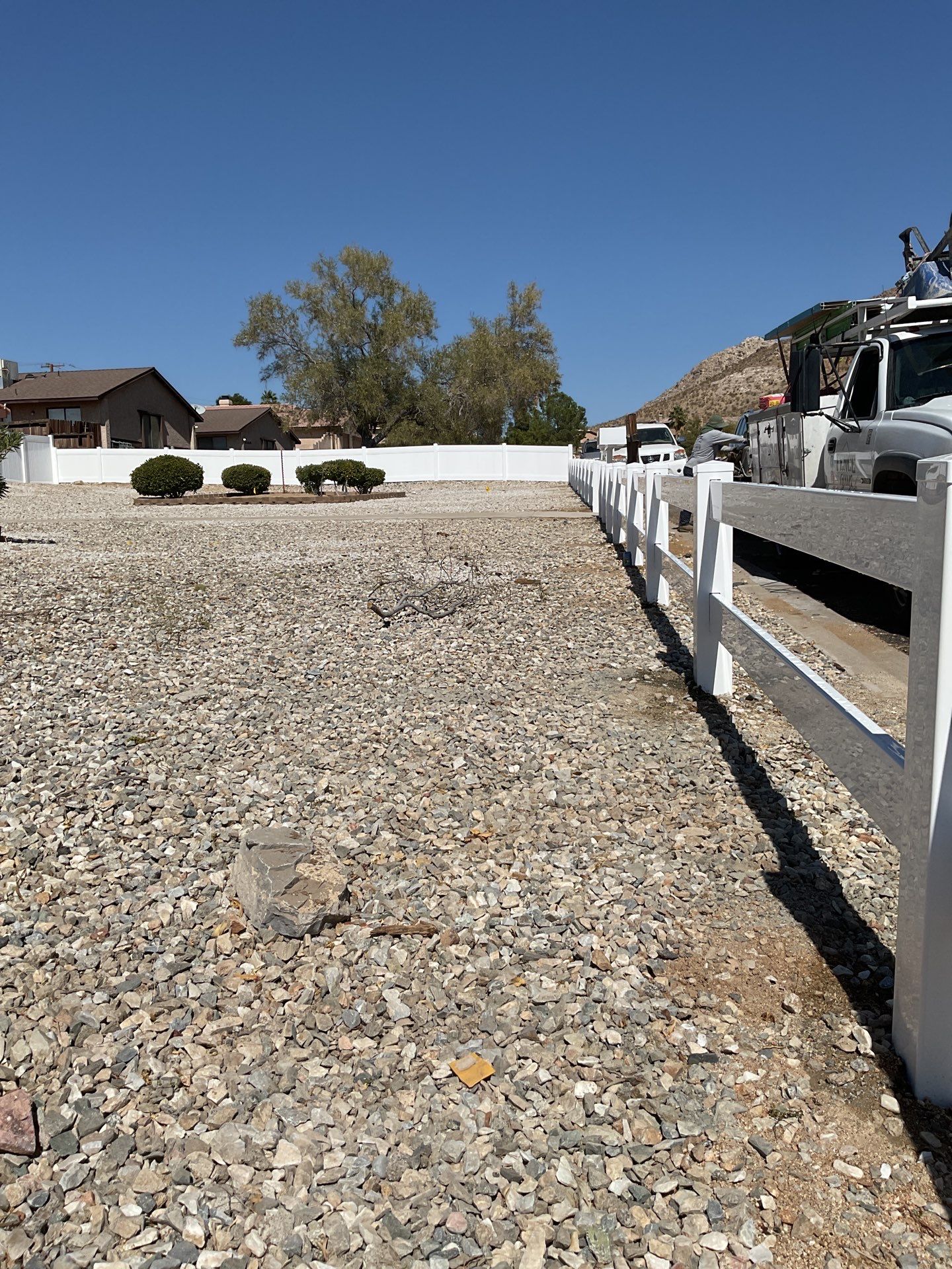 4' and 6' Privacy Vinyl with 2-Rail Ranch Style Vinyl Fence by Fence Guys Inc.