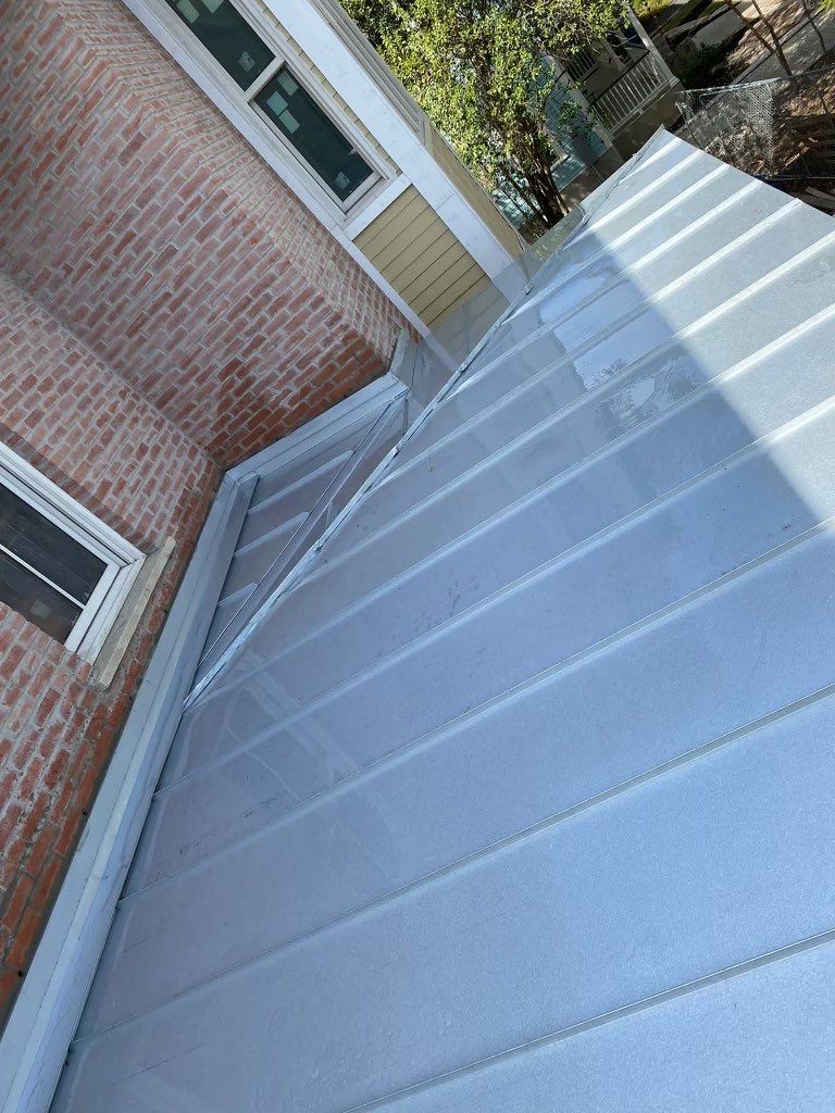 Residential Metal Roof Installation using McElroy Metal by Premier Roofing and Contracting