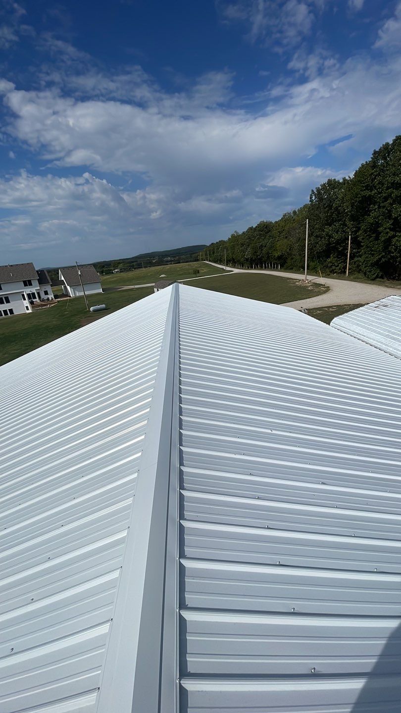 Metal Roof + Gutters & Downspouts Replacement  by Titan Commercial & Residential Roofing 