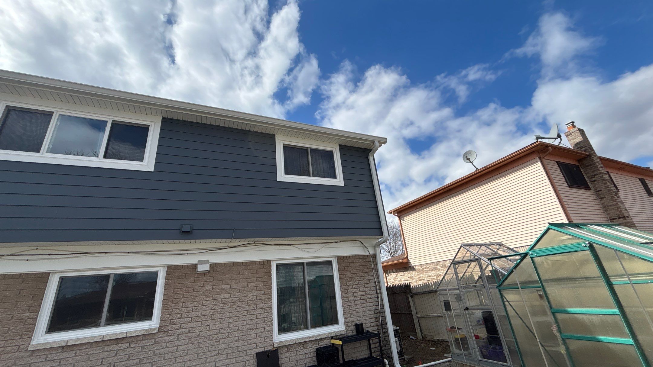 Siding Replacement using Alside Midnight Blue by 180 Contractors