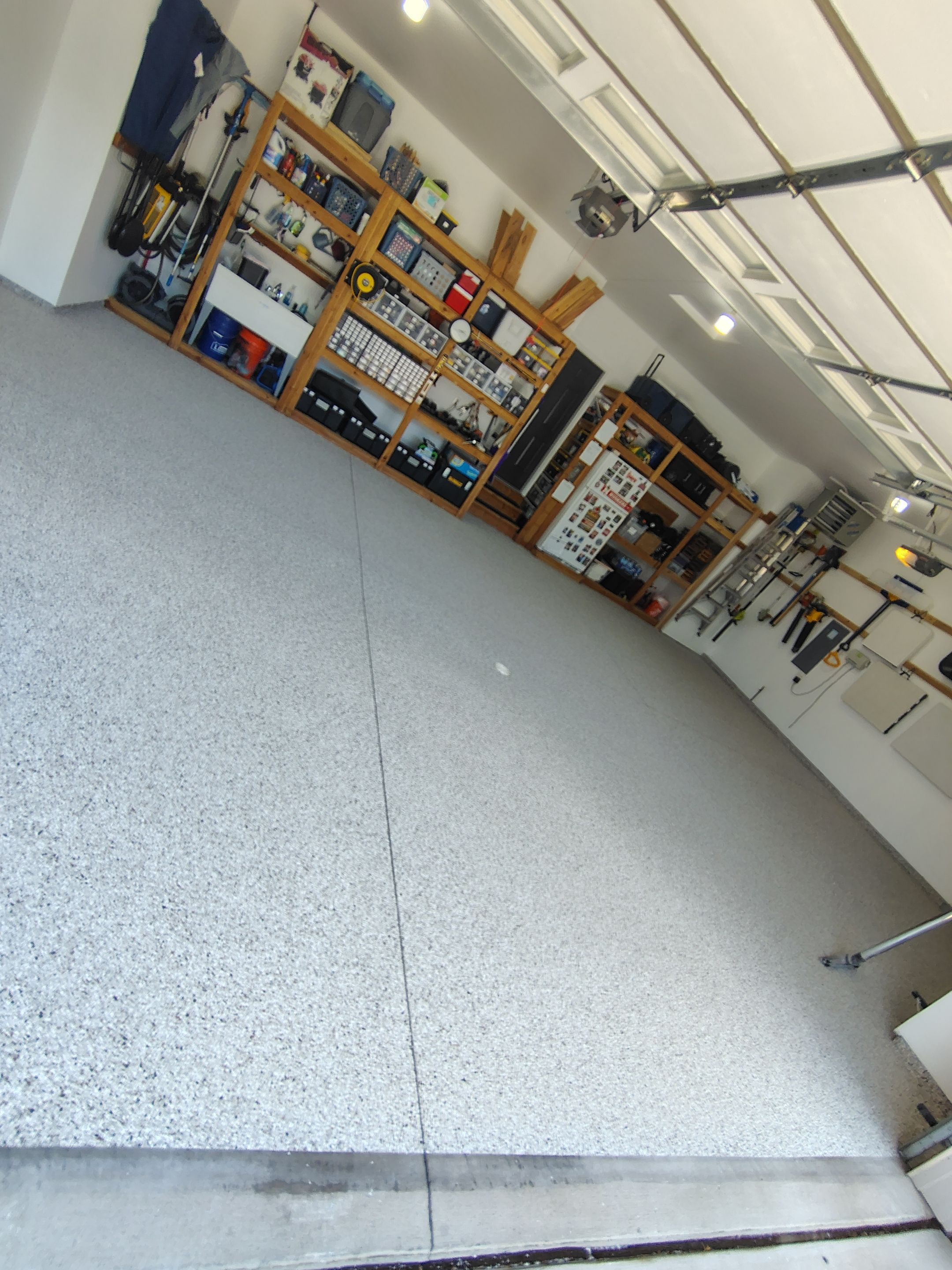 Coyote Garage Floor Coating in Sioux Falls by Select Painting, Coatings & Garage Cabinets
