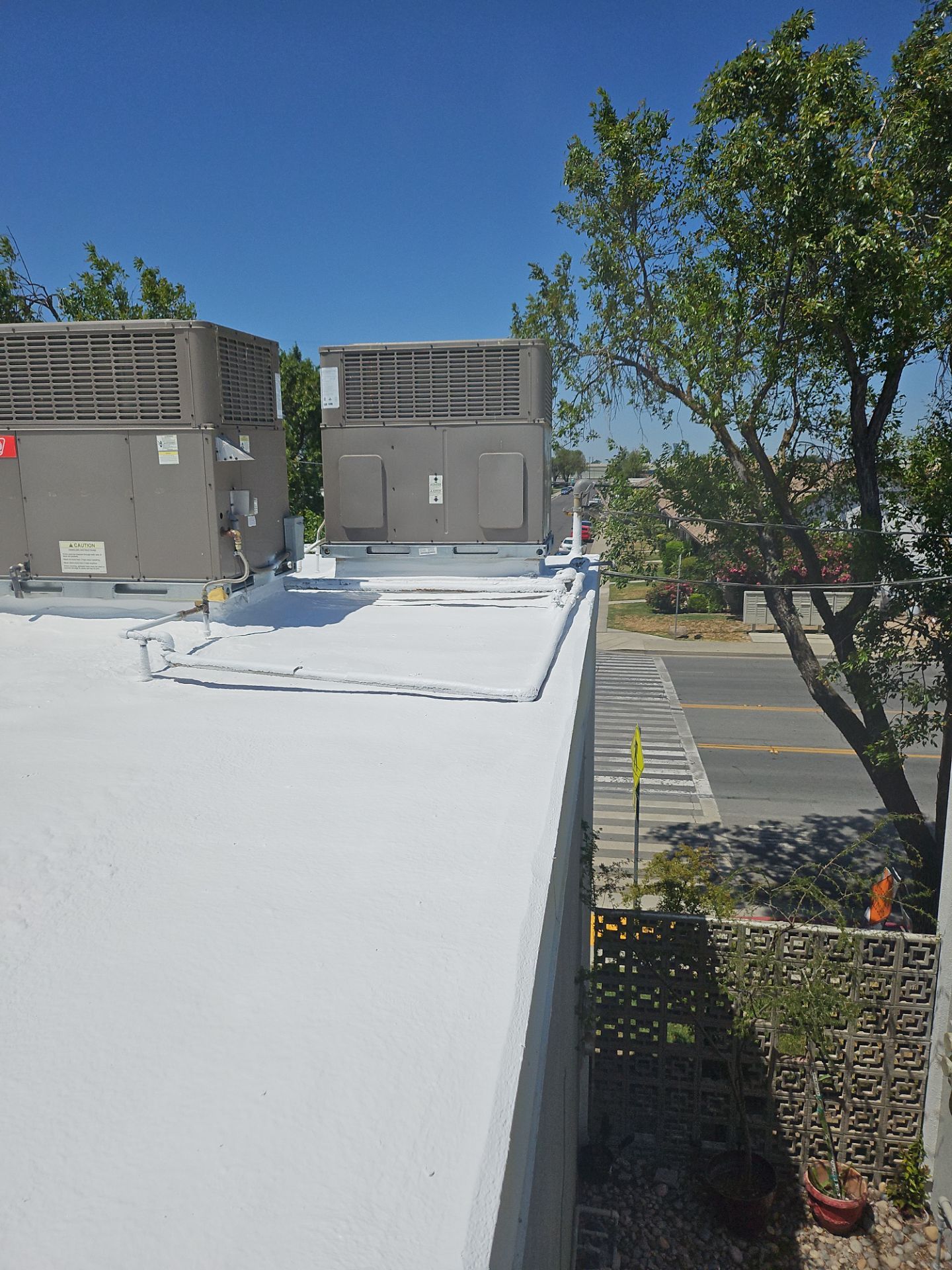 Foam Refurbish using General Coatings acrylic coatings and spray foam by Straight Edge Roofing Inc
