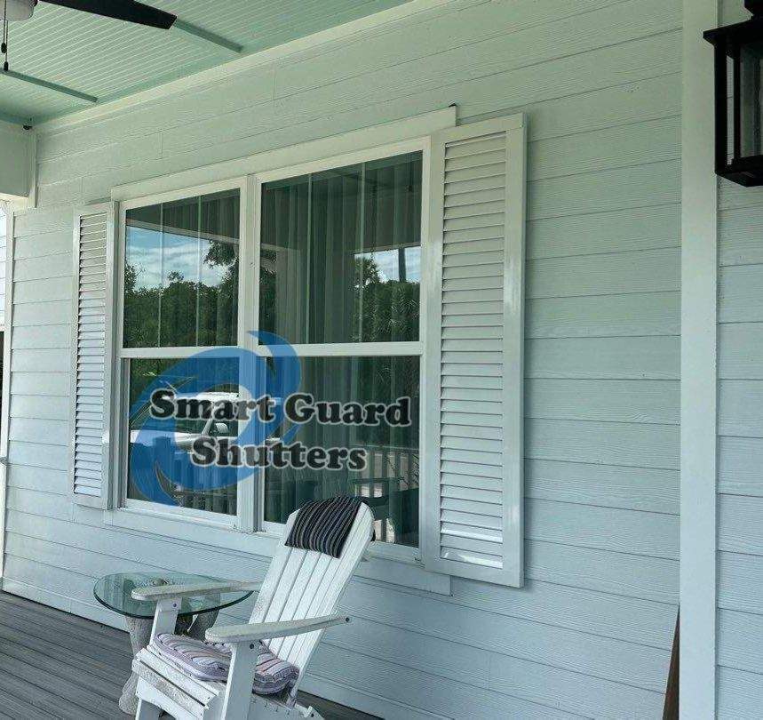 Decorative Colonials in Signal White by Smart Guard Shutters