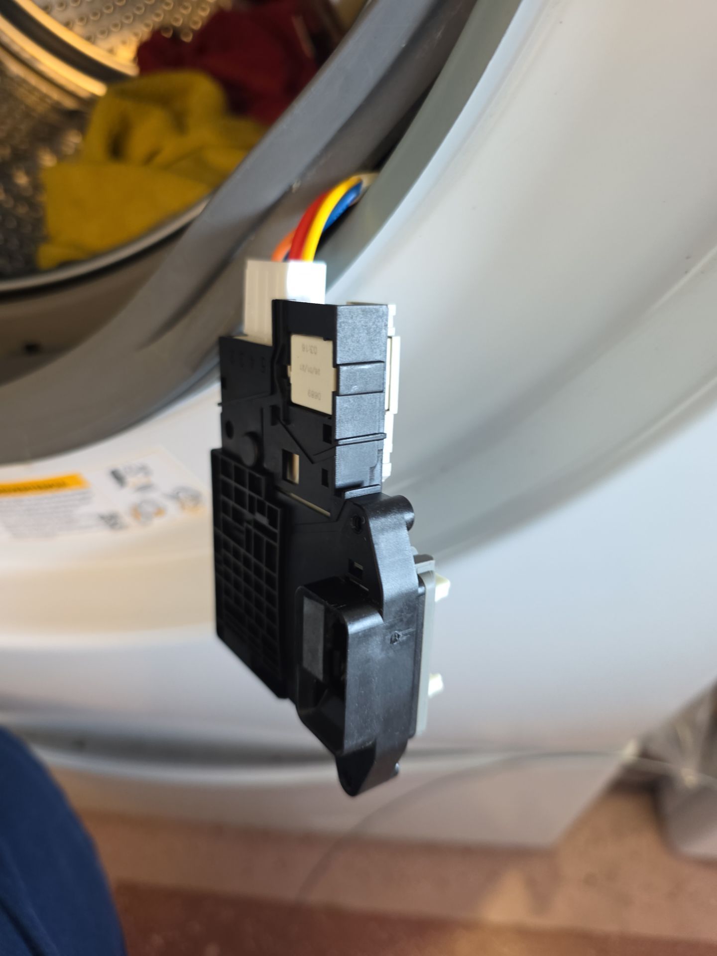 LG Washing Machine Door Latch Repair in The Villages by AMB-WORKS APPLIANCE REPAIR