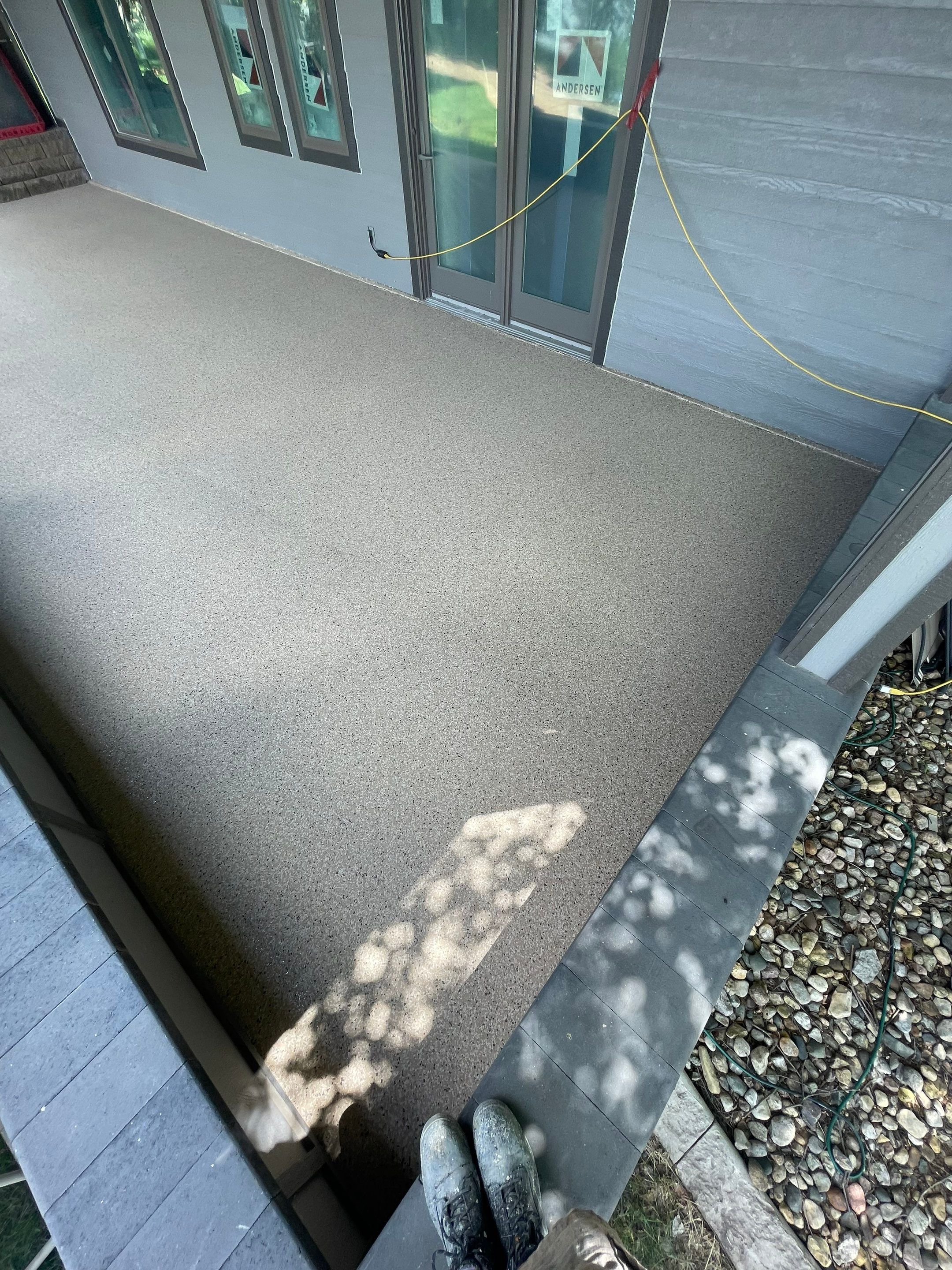 Lakefront Screened Patio Concrete Coating Installation in Wentworth by Select Painting, Coatings & Garage Cabinets