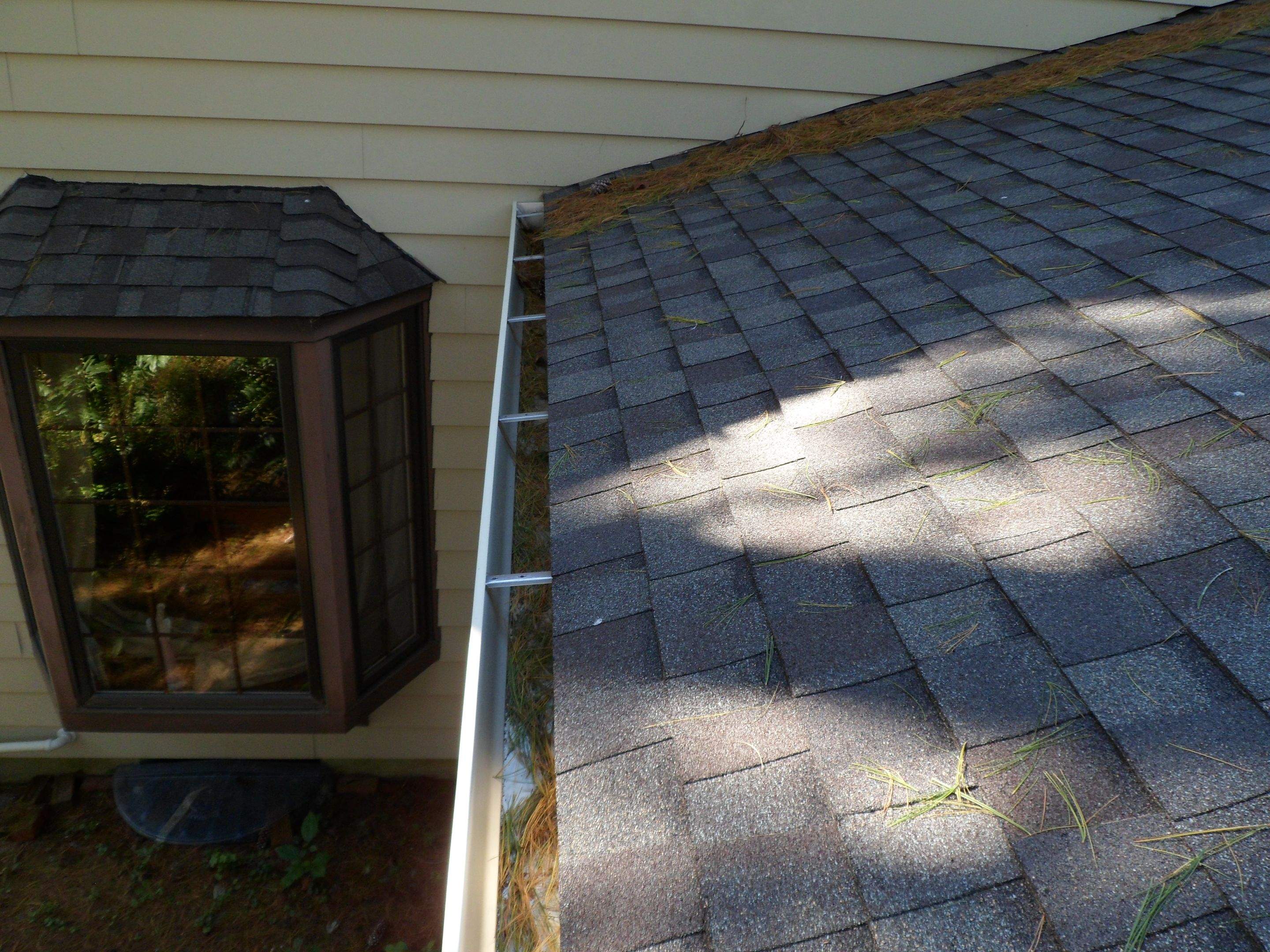 Residential Roofing Installation using Landmark Shingles Color Weatherwood by Alpha Design Services