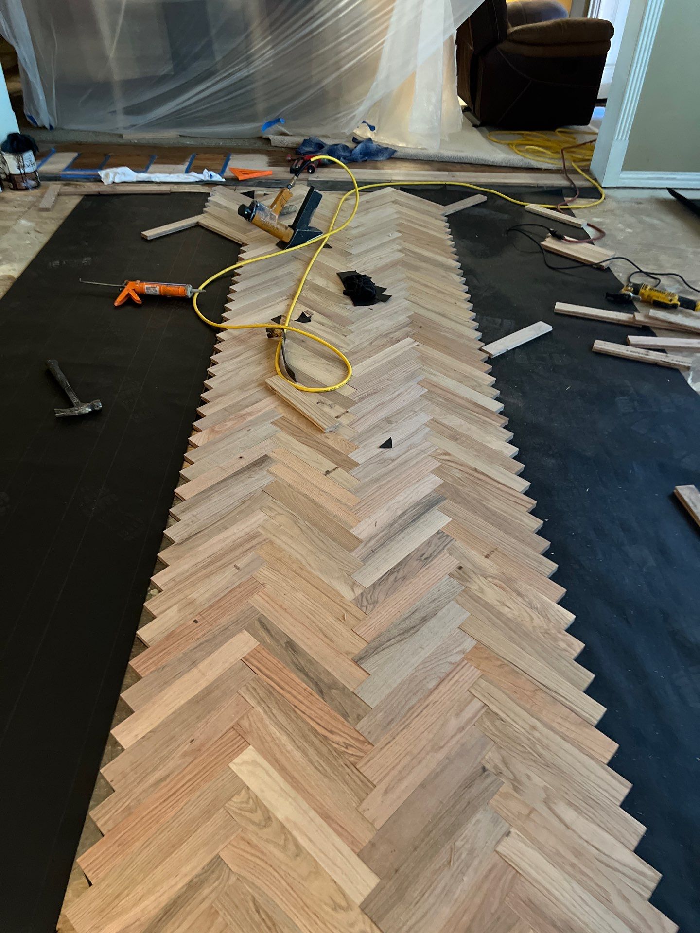 Long Herringbone in living rooms rock by Bernard Hardwood Floors