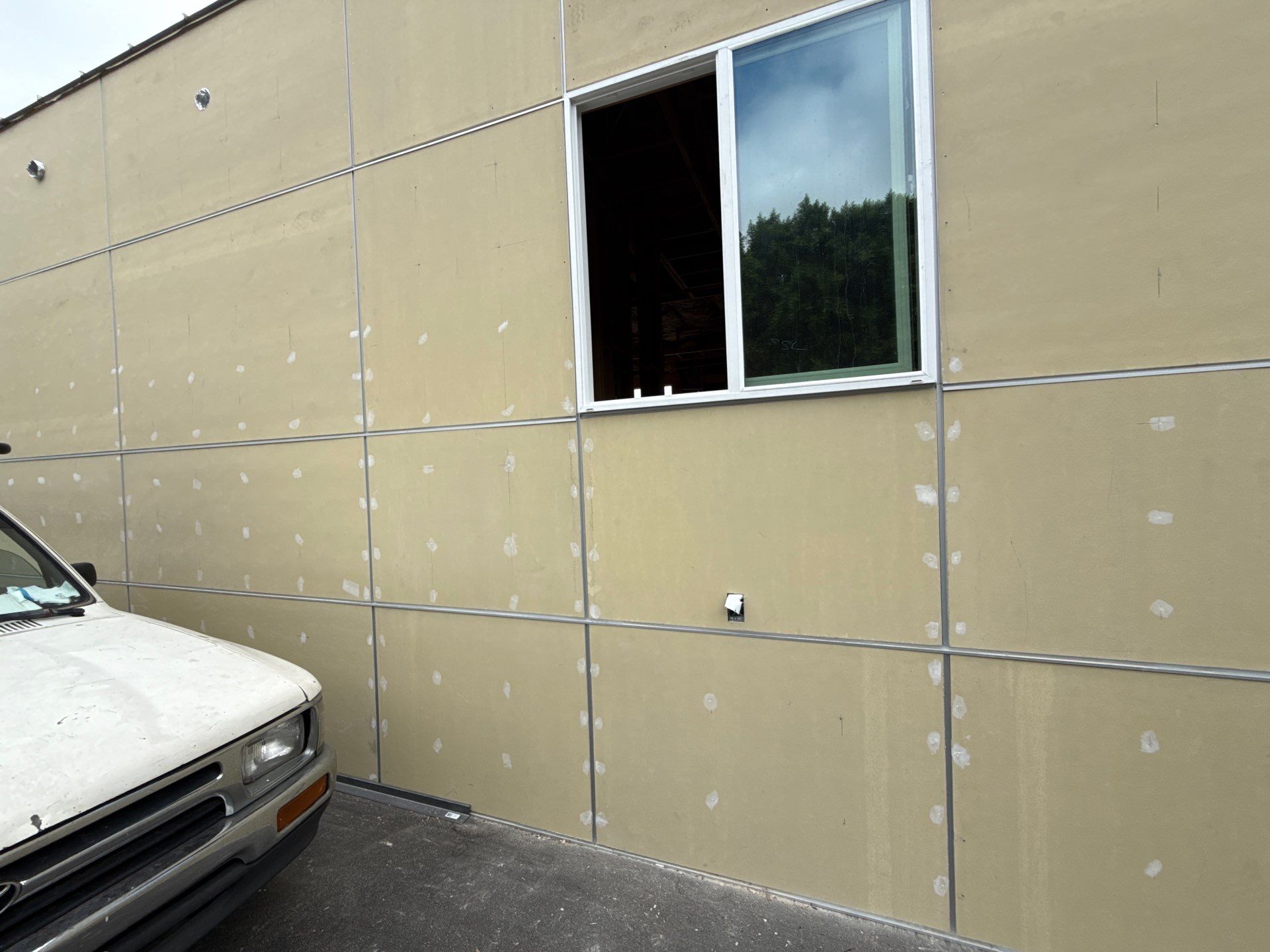 Panels and metals  by New Era Siding Inc 