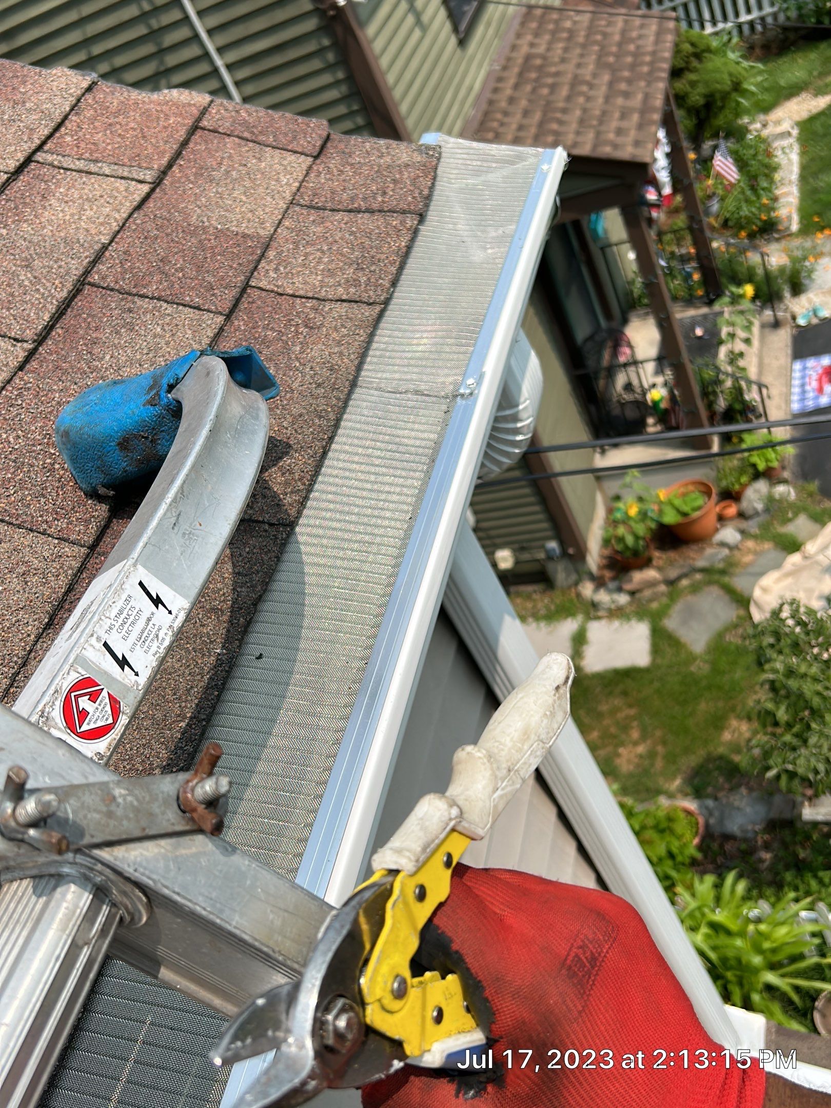 Gutter Installation using 5k White gutters by A Plus Exterior