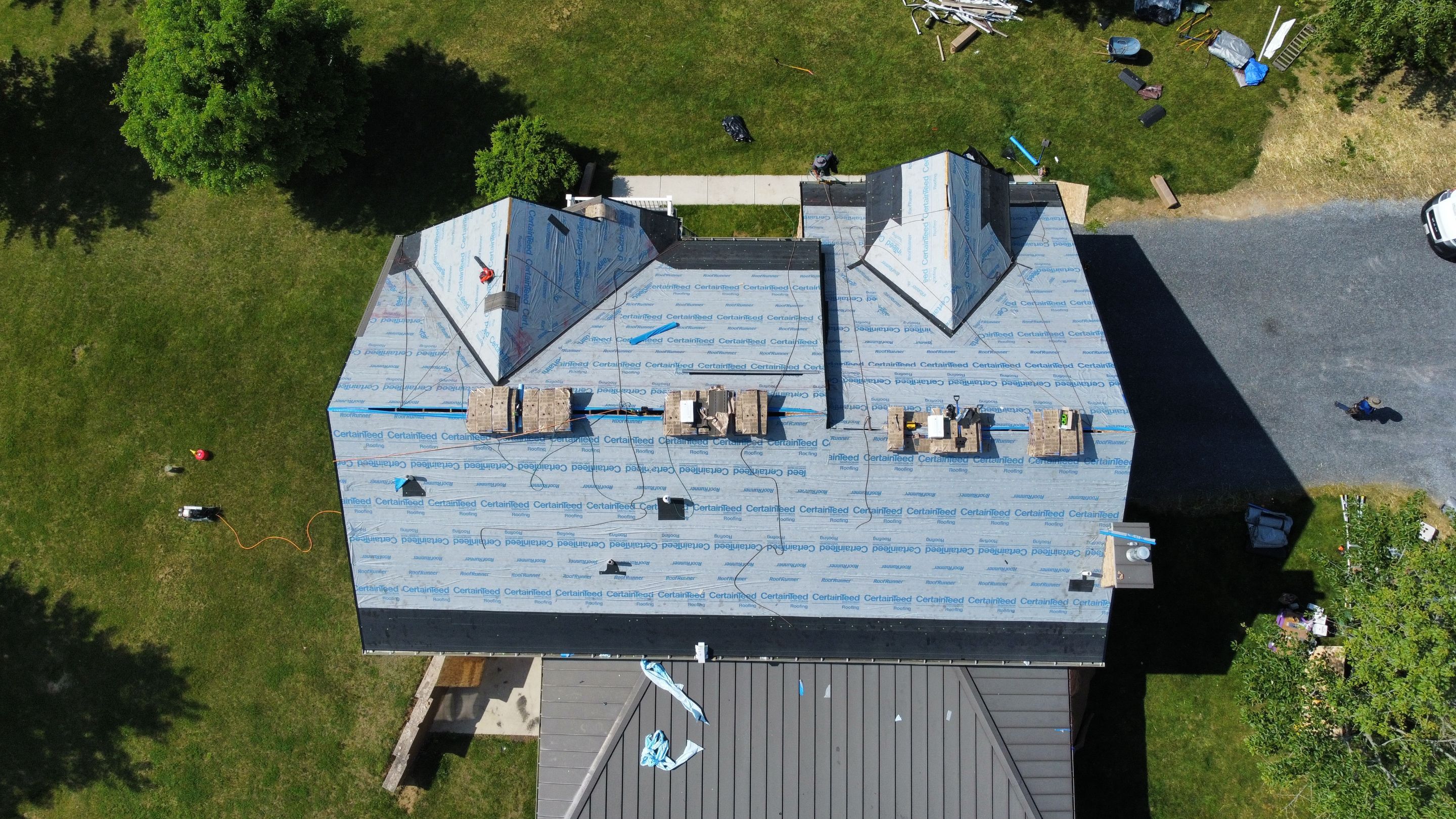 Roof Damage using Certainteed Lifetime Roofing System- Moire Black Landmark Pro shingkes with shadow ridge caps. by BulletpROOF Exteriors