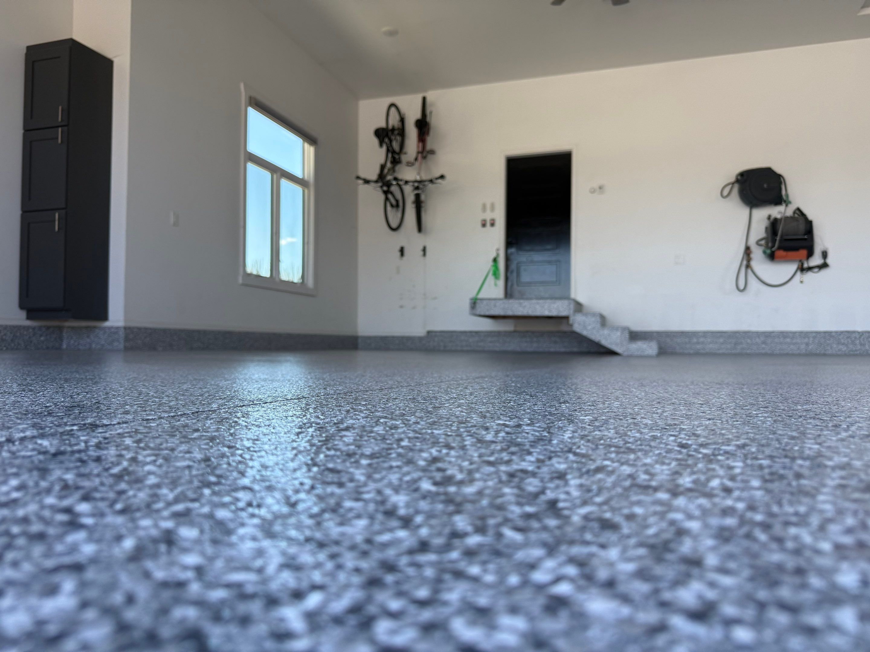 Gravel Flake Garage Floor Coating in Yankton by Select Painting, Coatings & Garage Cabinets