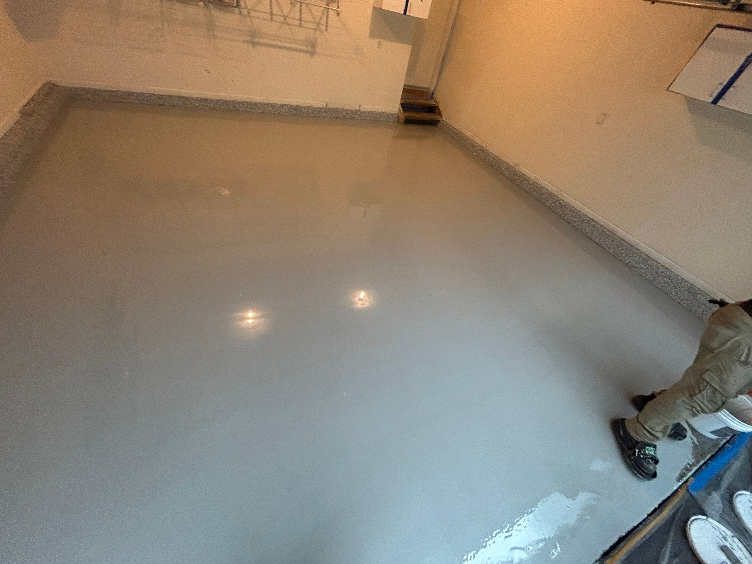 Concrete Floor Coating Using Gravel Color by DiGiorgi Roofing and Siding Inc