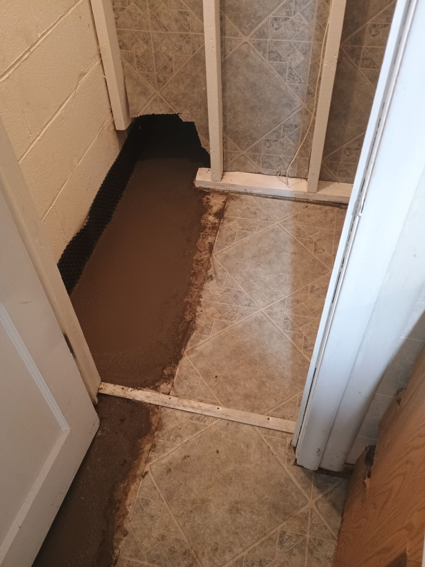 Drain Tile & a Sump Pump for our Property Management Partner by Waterproofing Northeast