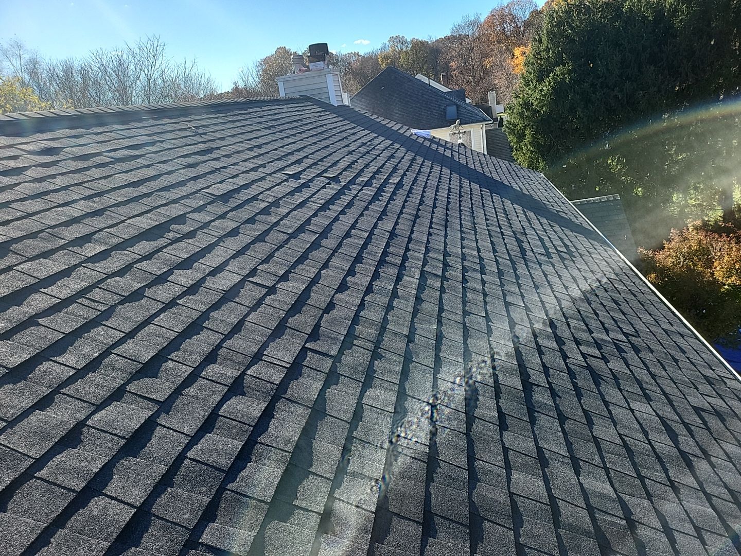 Residential Roofing Installation using Certainteed Landmark Moire Black by A Plus Exterior